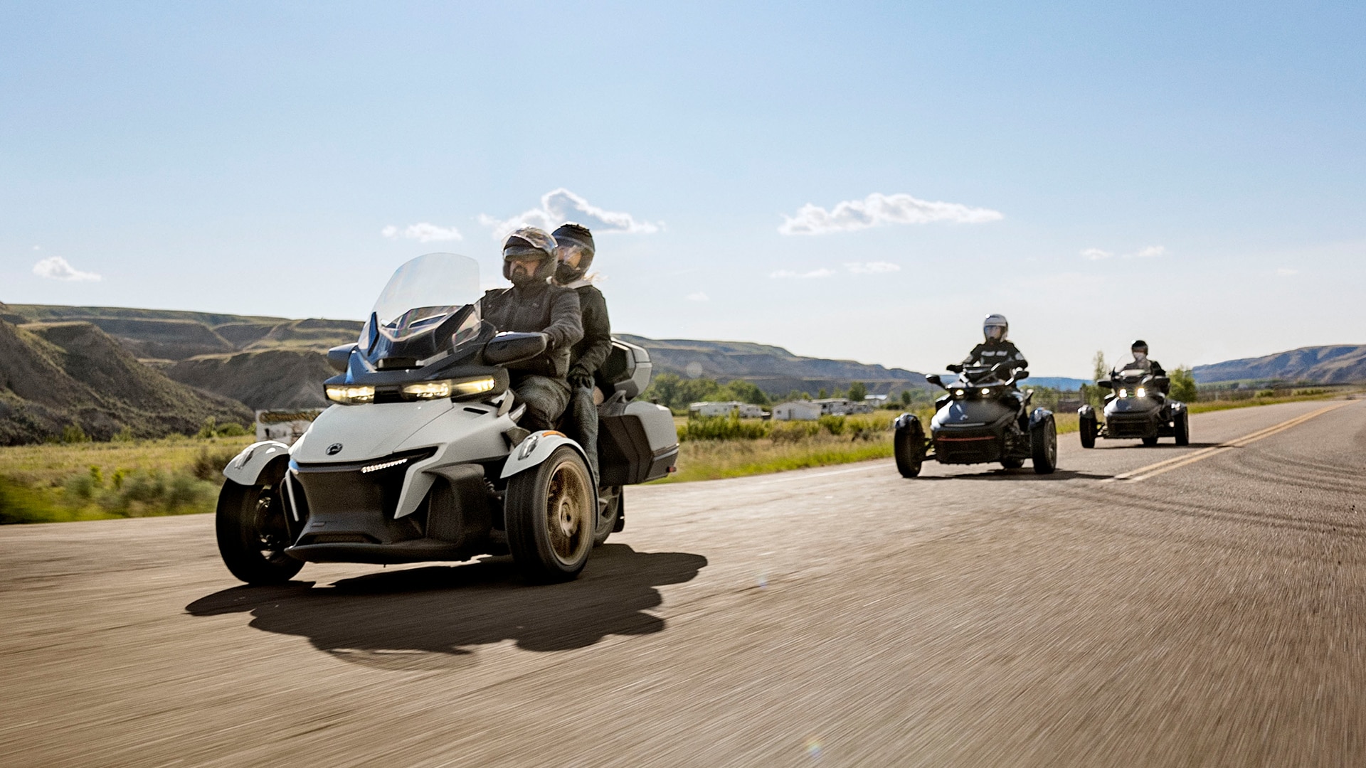 3 riders driving towards their nearest Can-Am dealerships