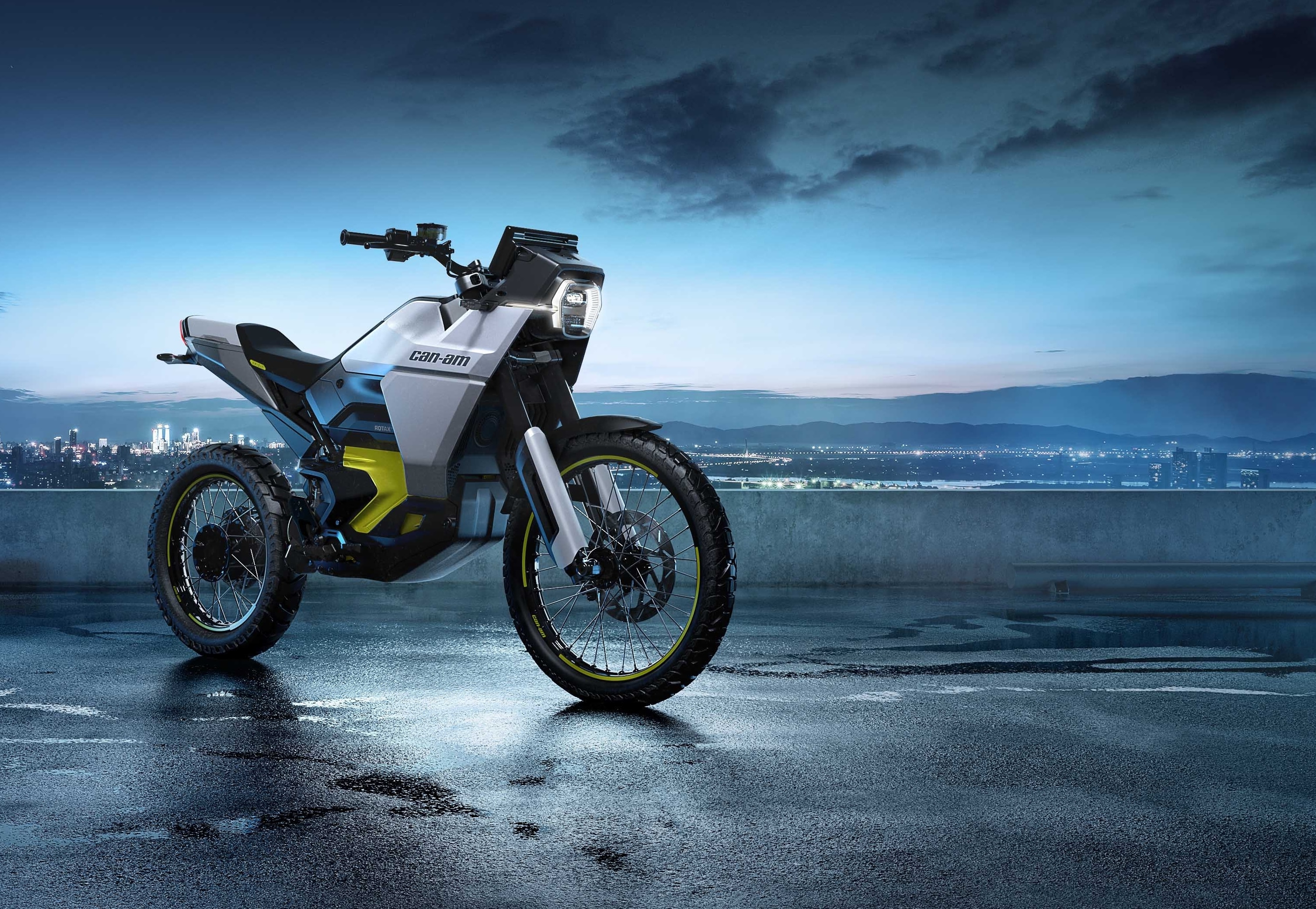 Can-Am Origin, Dual Sport Electric Motorcycle posing with a city background