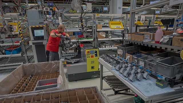 Rotax engine assembly in Lynx snowmobile factory