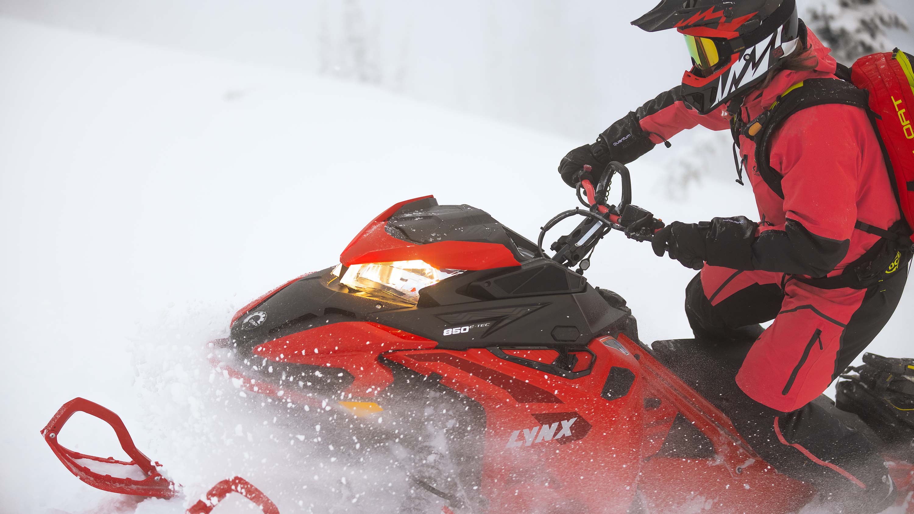 Closeup of Lynx BoonDocker snowmobile rider on terrain