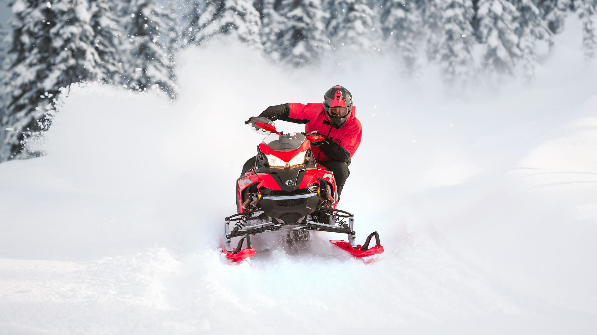 Lynx Rave snowmobile riding on trail