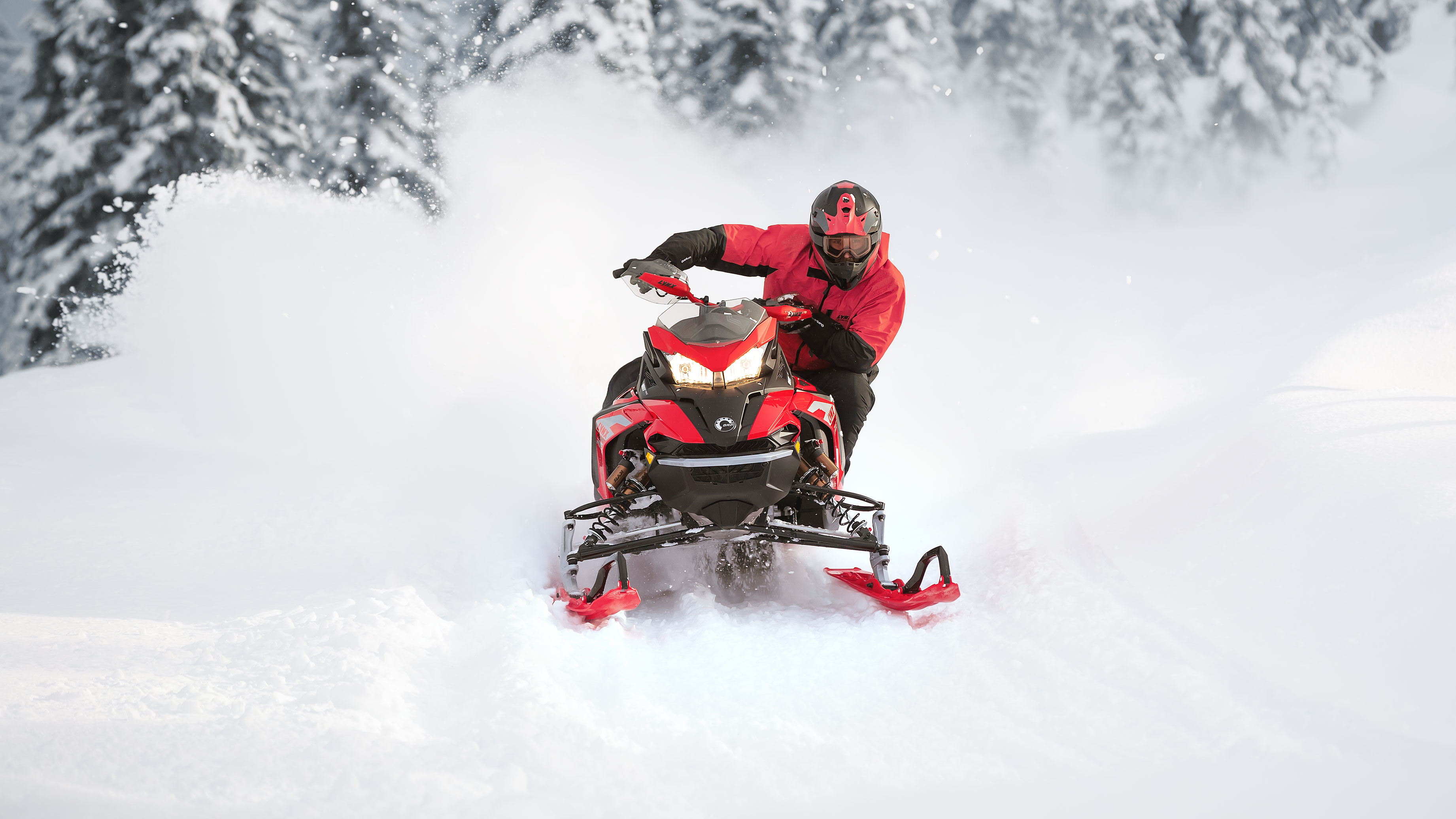 Someone riding a Lynx snowmobile