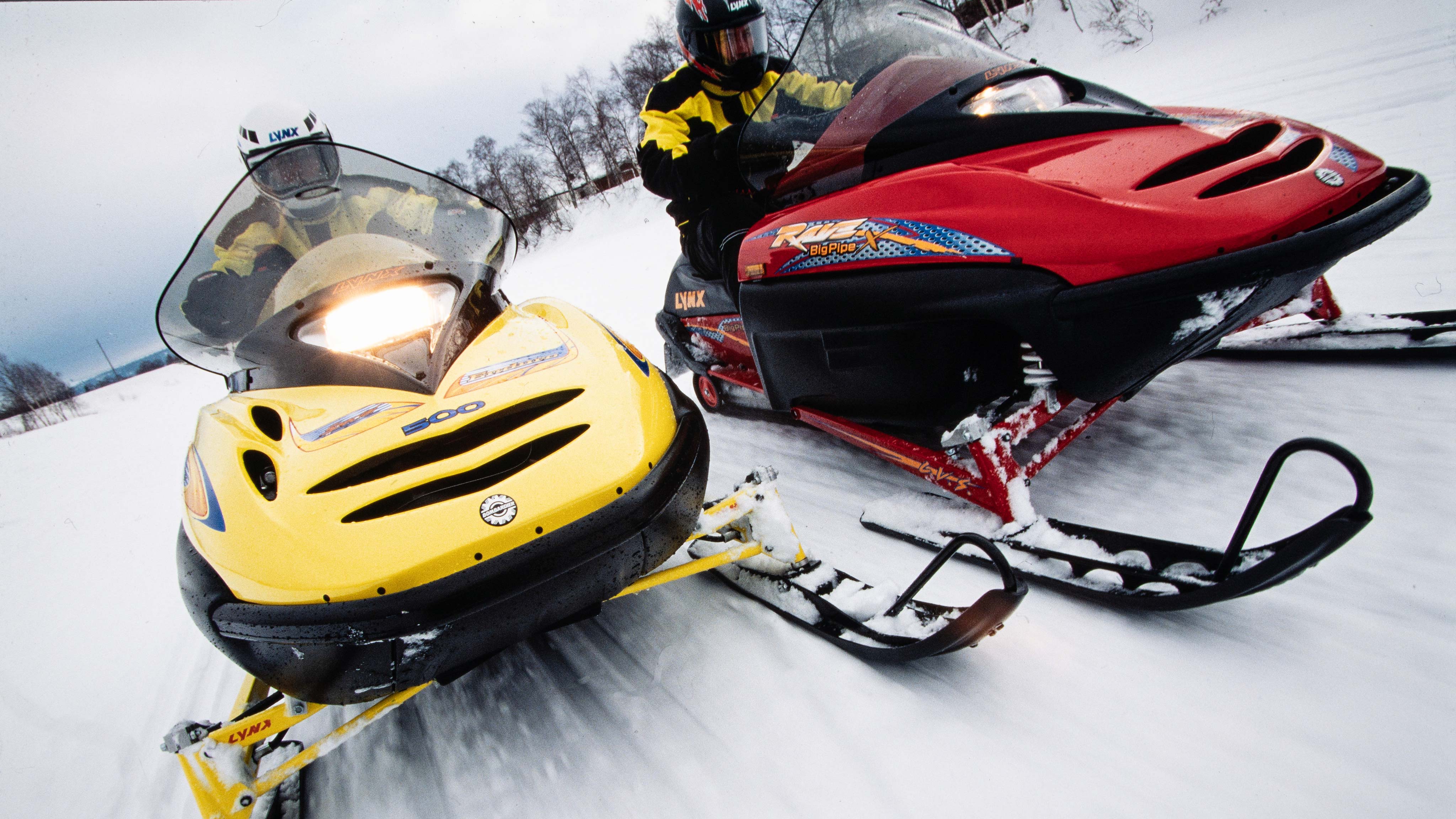 Lynx G-Type Enduro and Rave riding on a snowmobile trail