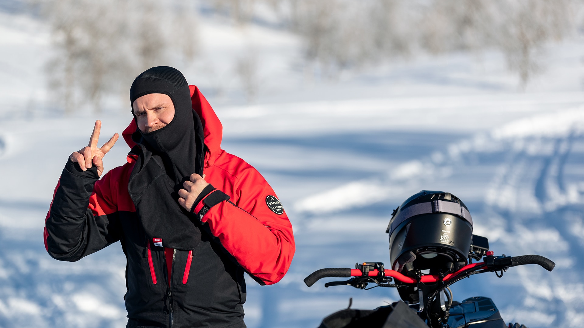 A rider posing with Lynx riding gear