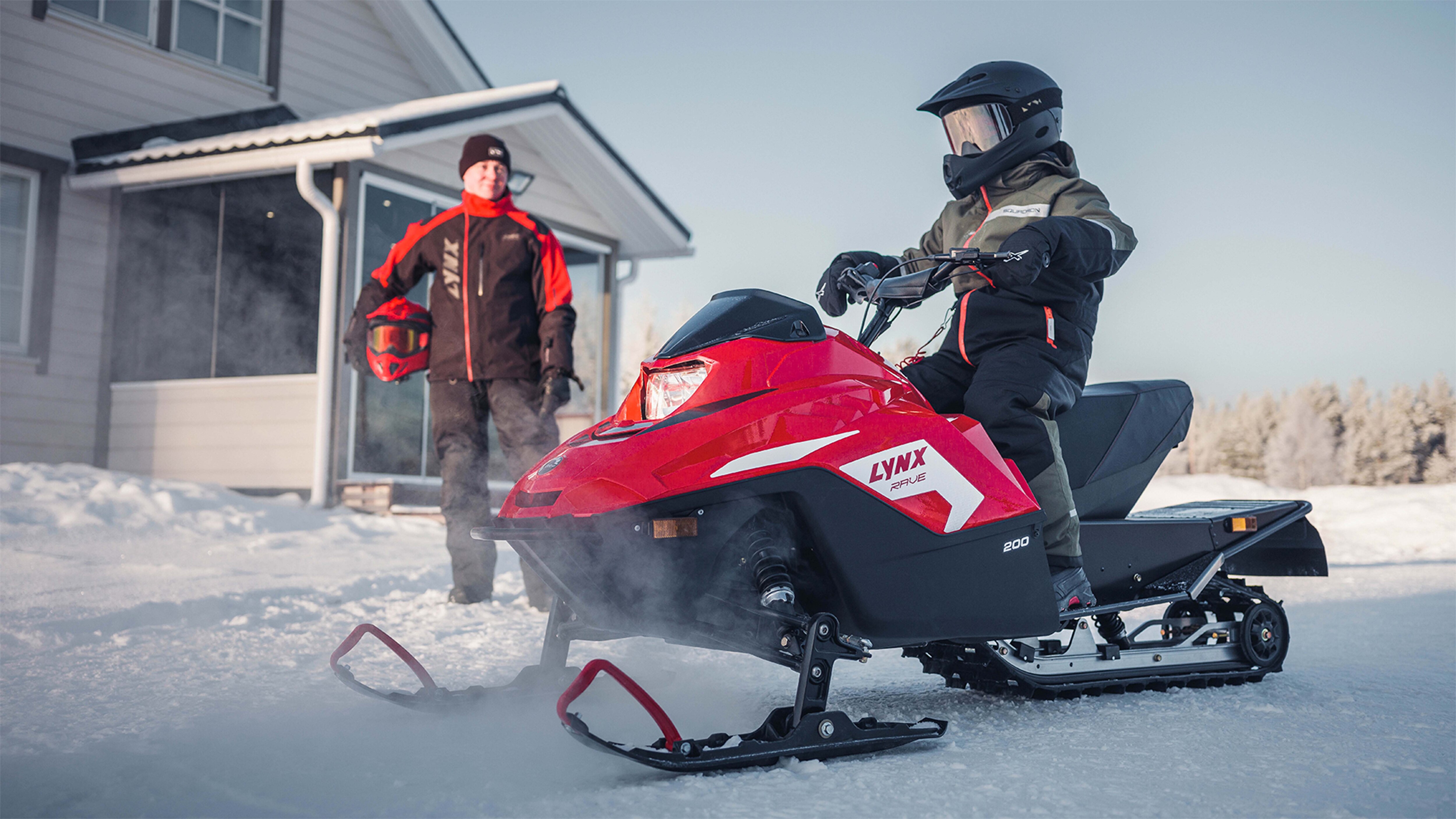 Lynx Rave RE snowmobile riding on bumpy trail