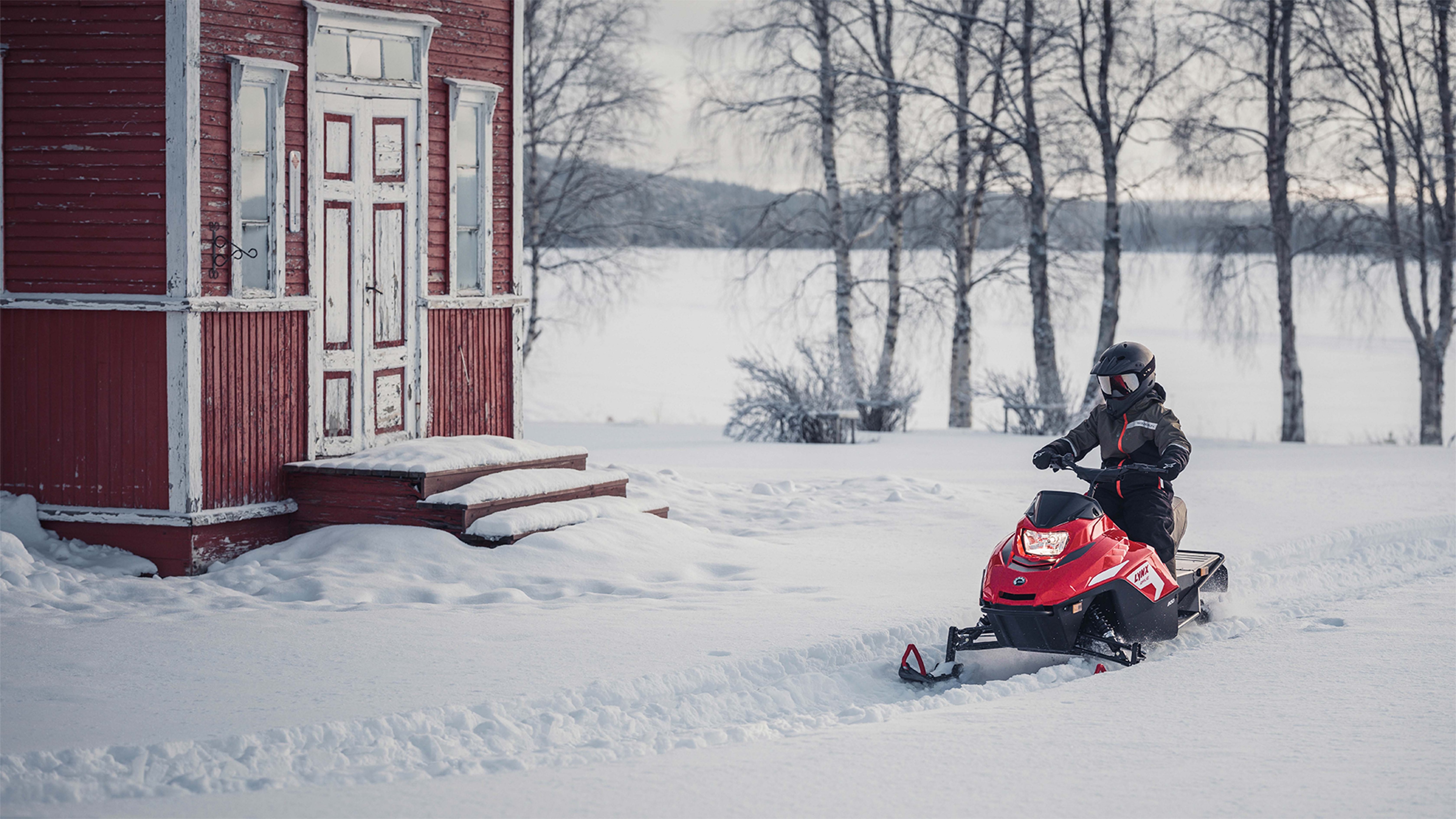 Kids riding on the yard with Lynx Rave 200