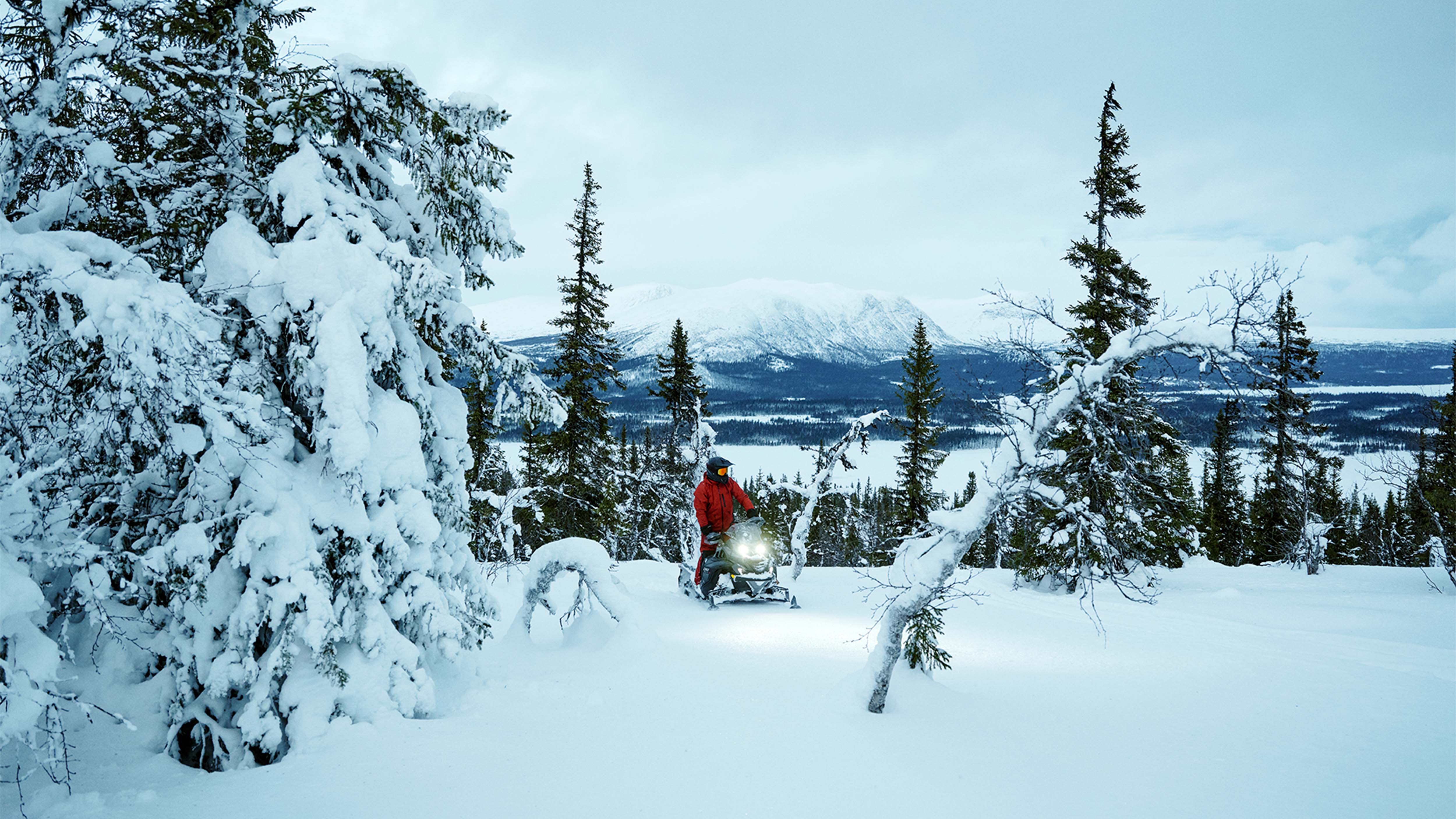 Lynx Brutal RE 2025 snowmobile on snowy fells