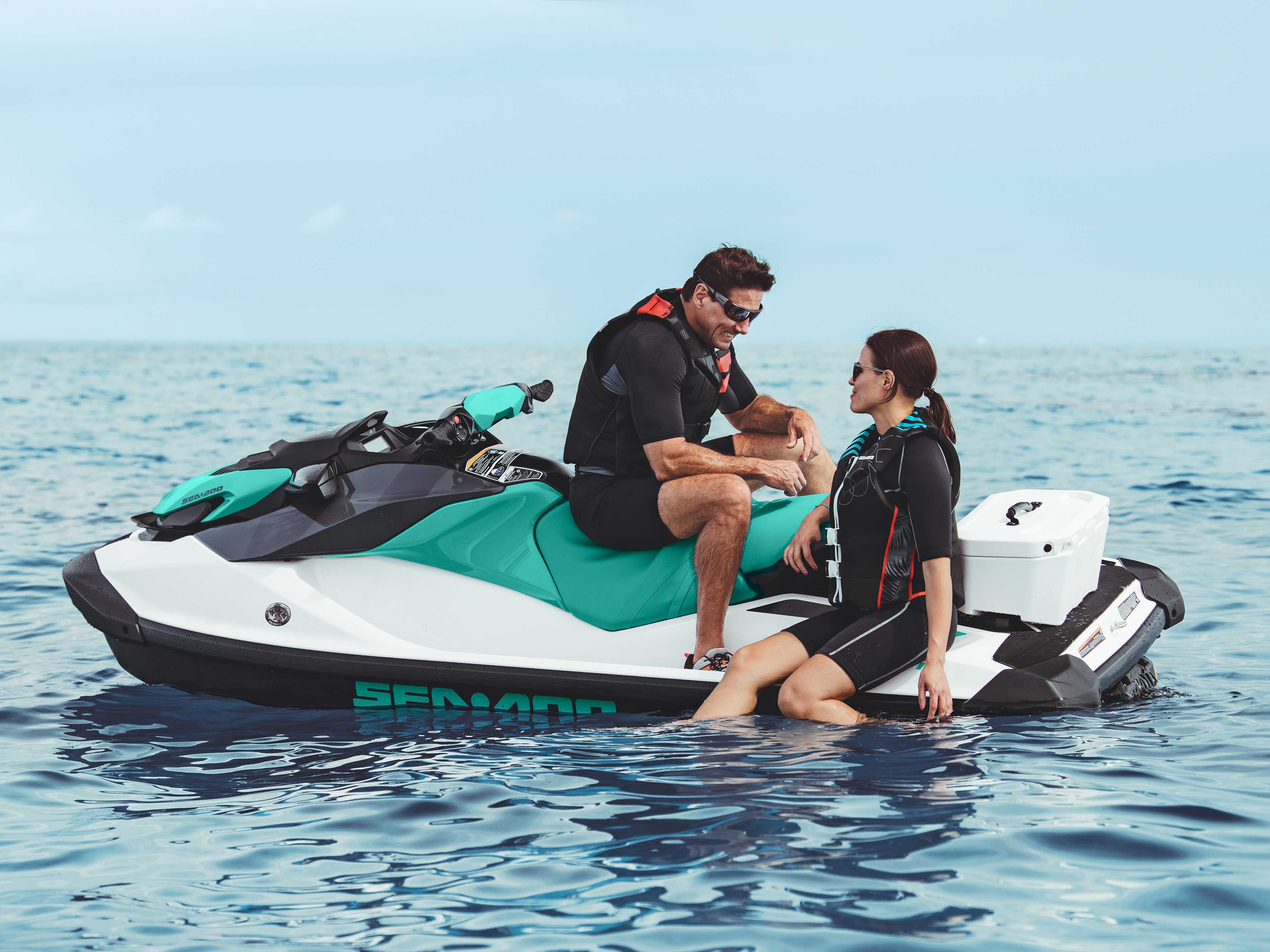 Couple enjoying the Sea-Doo GTI swim platform