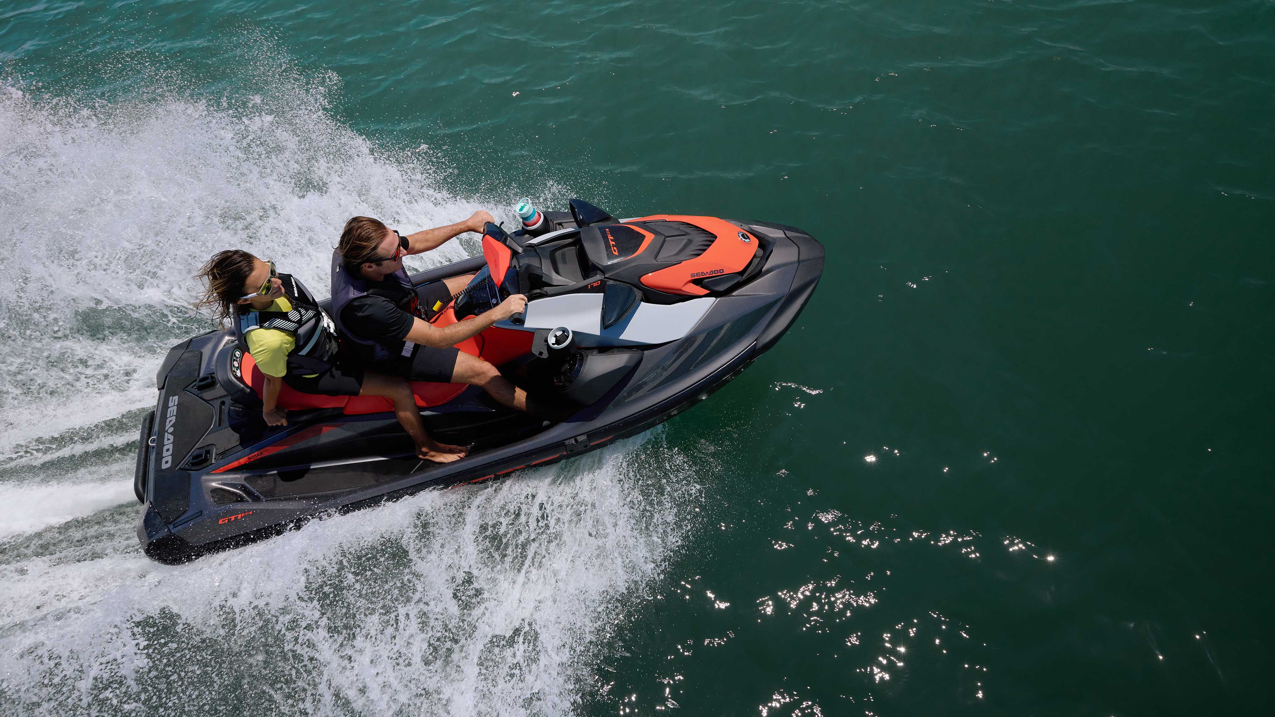 Couple riding the new 2022 Sea-Doo GTI