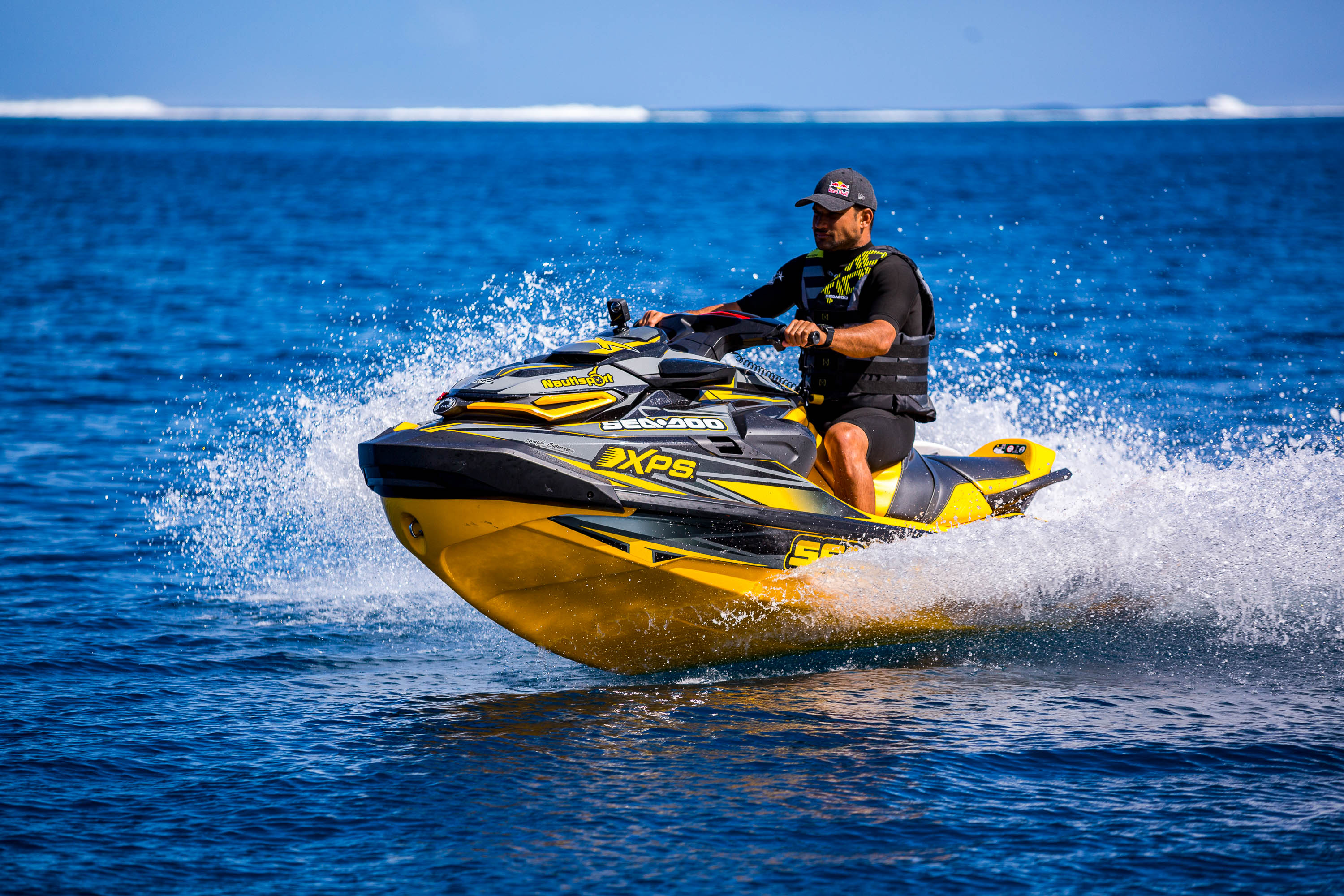 Michel Bourez on a Sea-Doo in Tahiti