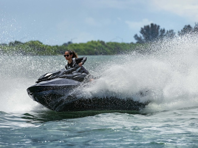 Woman carving water with the 2022 Sea-Doo RXP-X