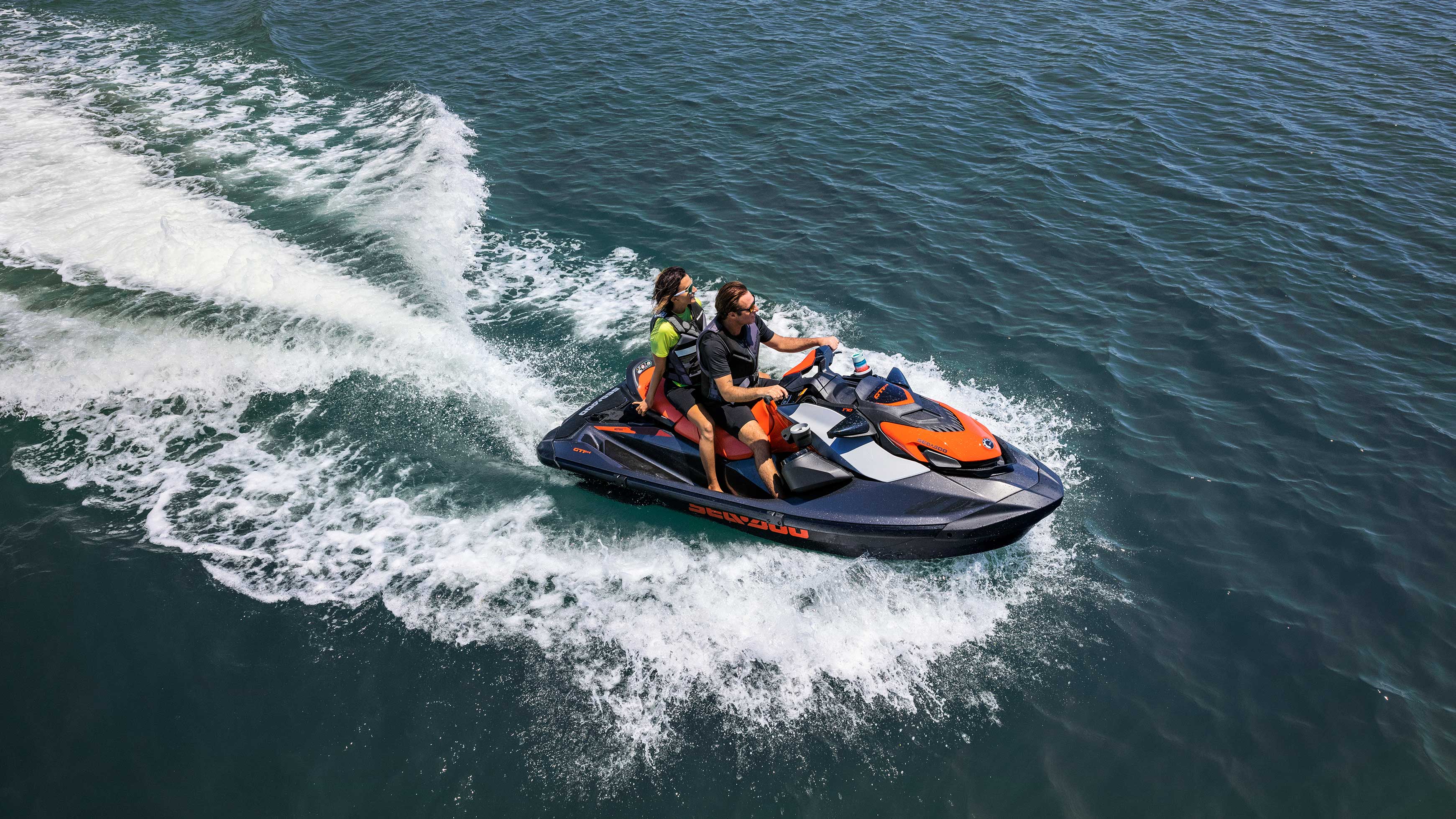 Couple enjoying a ride on their Sea-Doo GTI SE