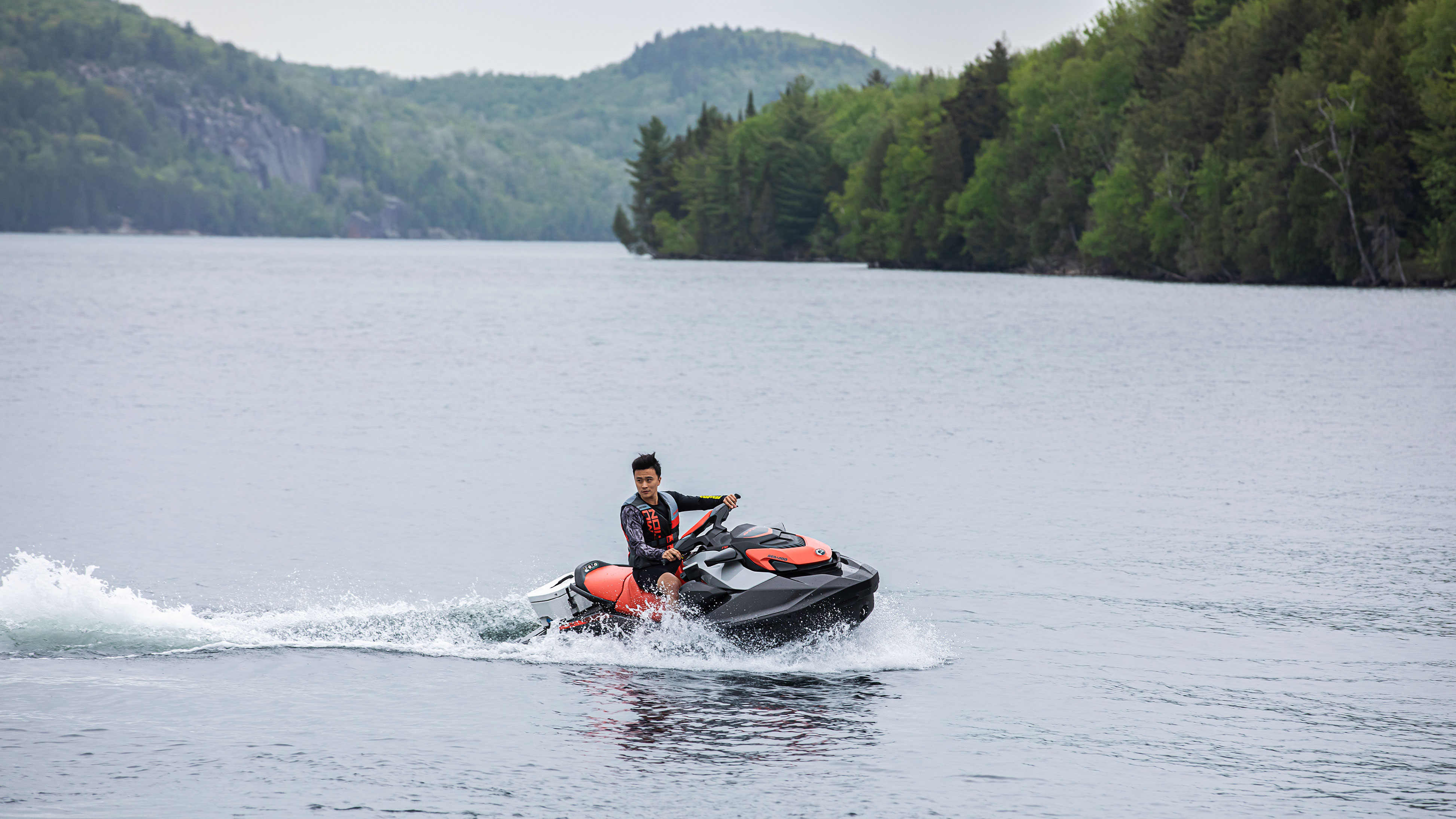 Man riding his coral Sea-Doo GTI 170