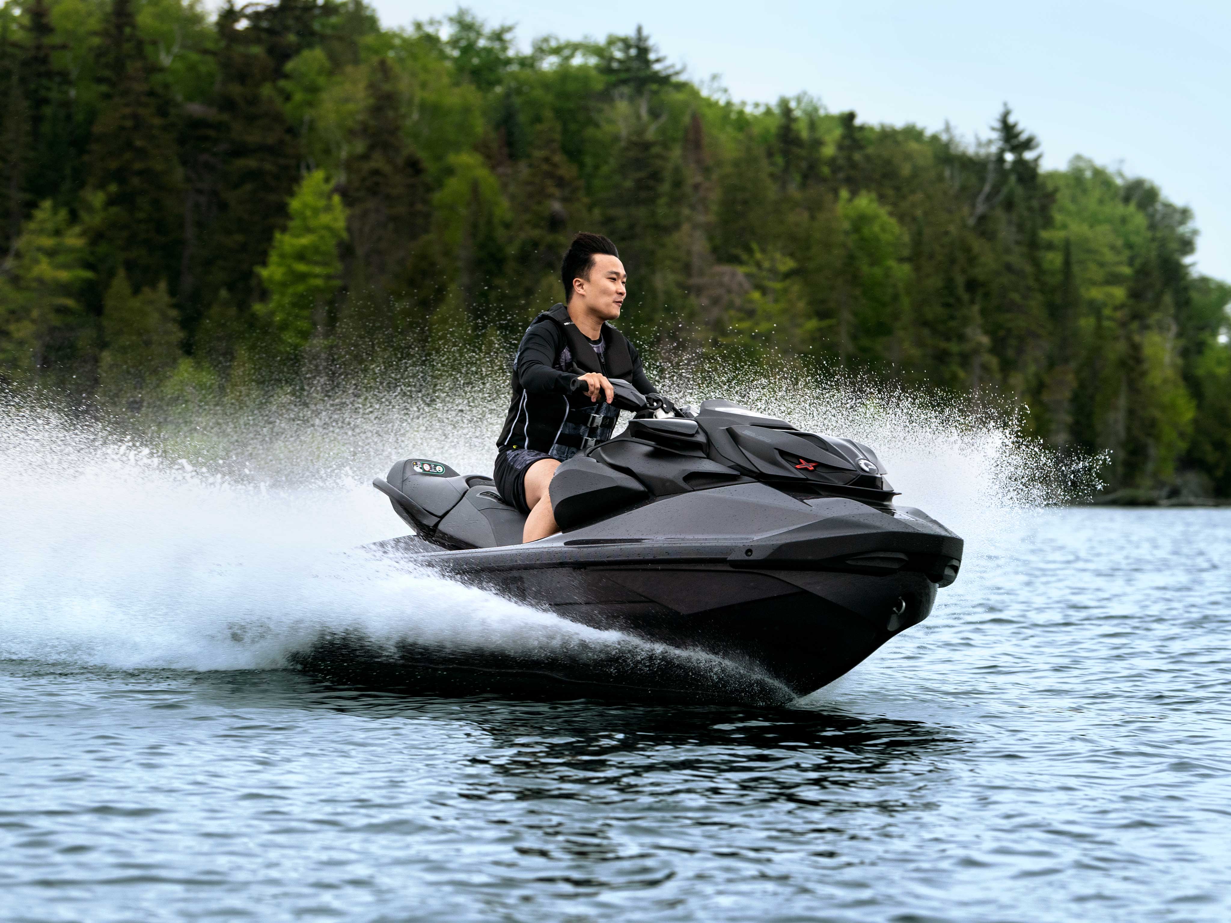 Man riding the Sea-Doo RXP-X