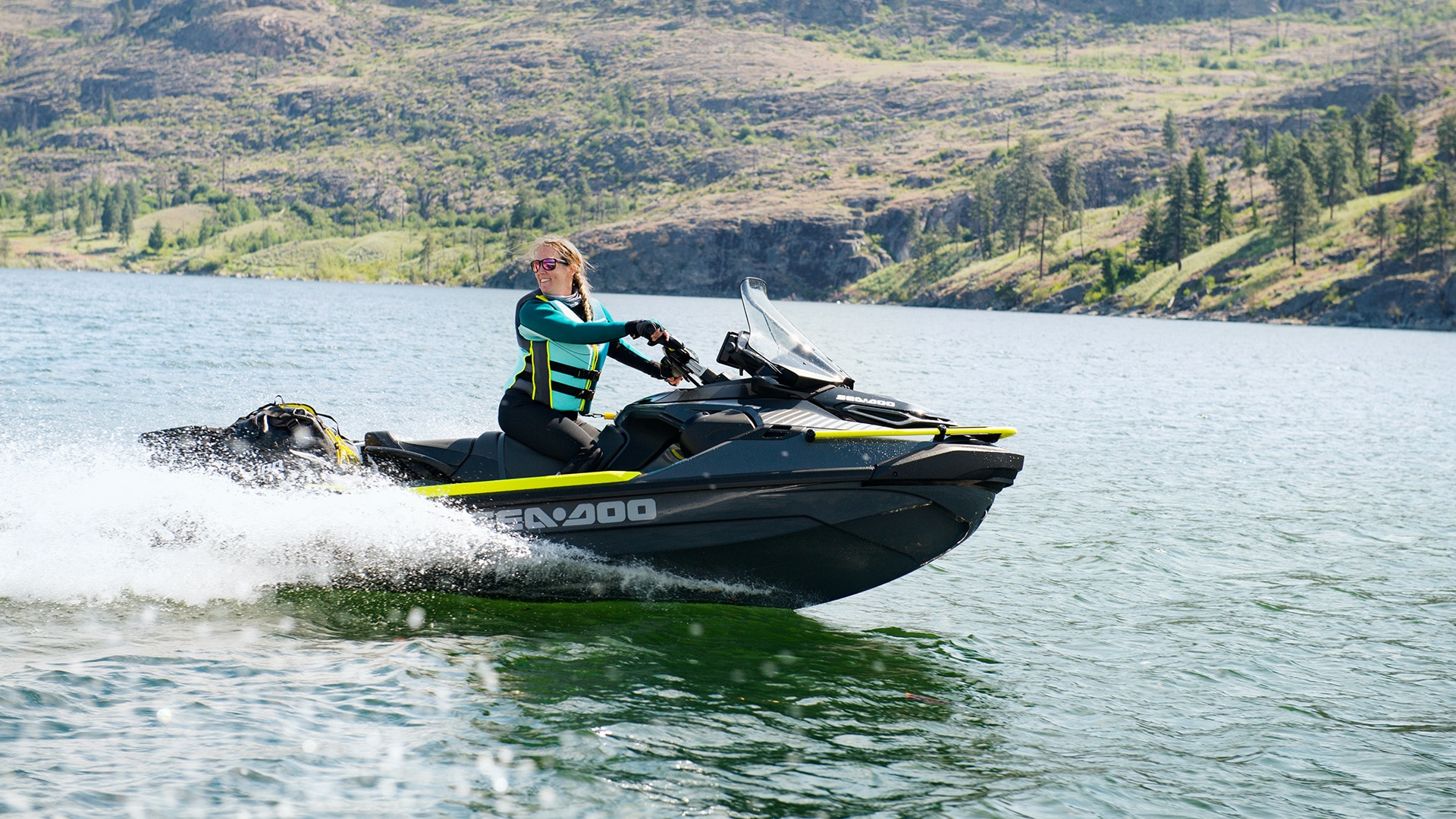 Woman driving the new Sea-Doo Explorer Pro 170