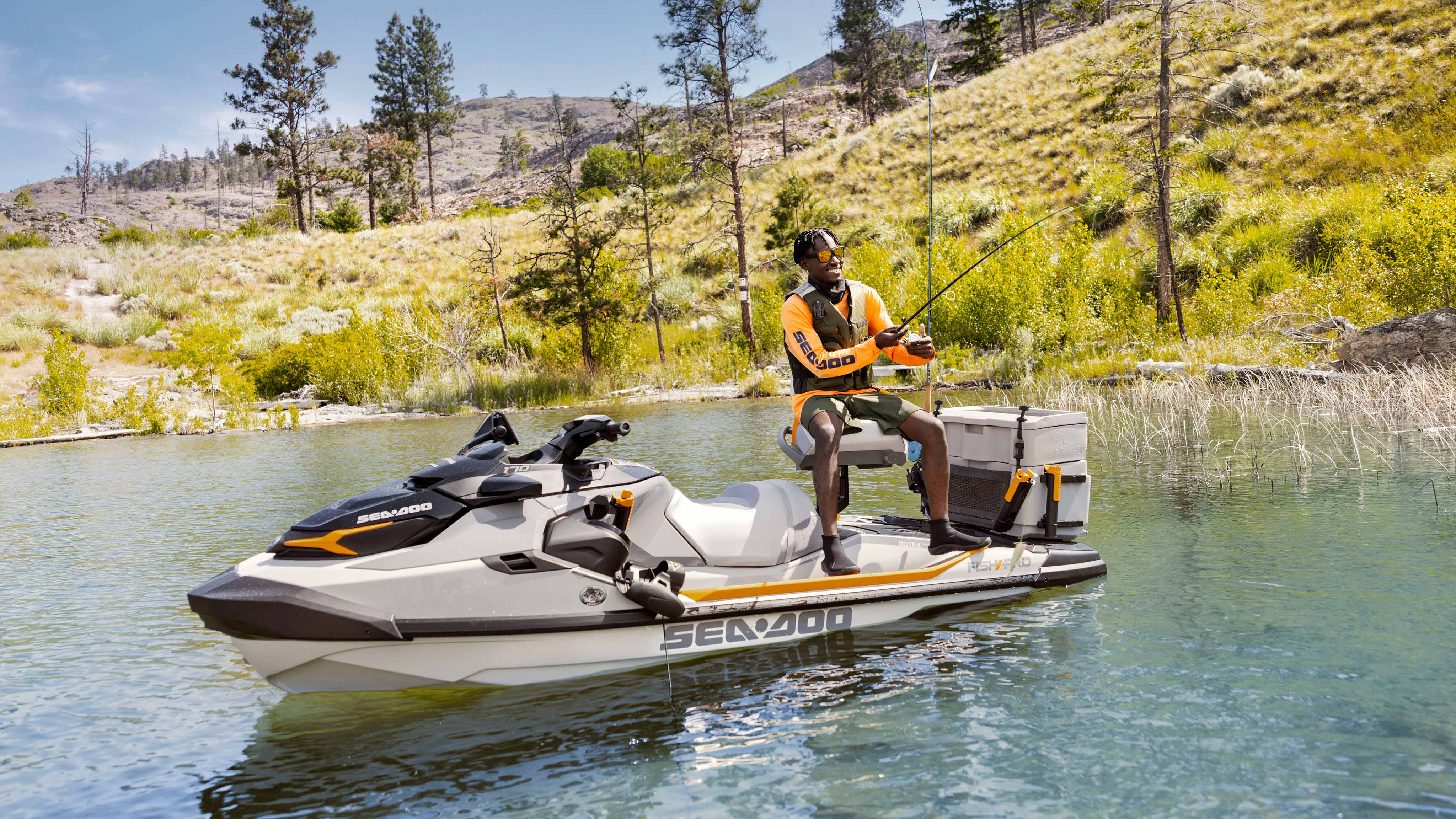 Man fishing on her Sea-Doo FishPro Trophy with the modular swivel seat