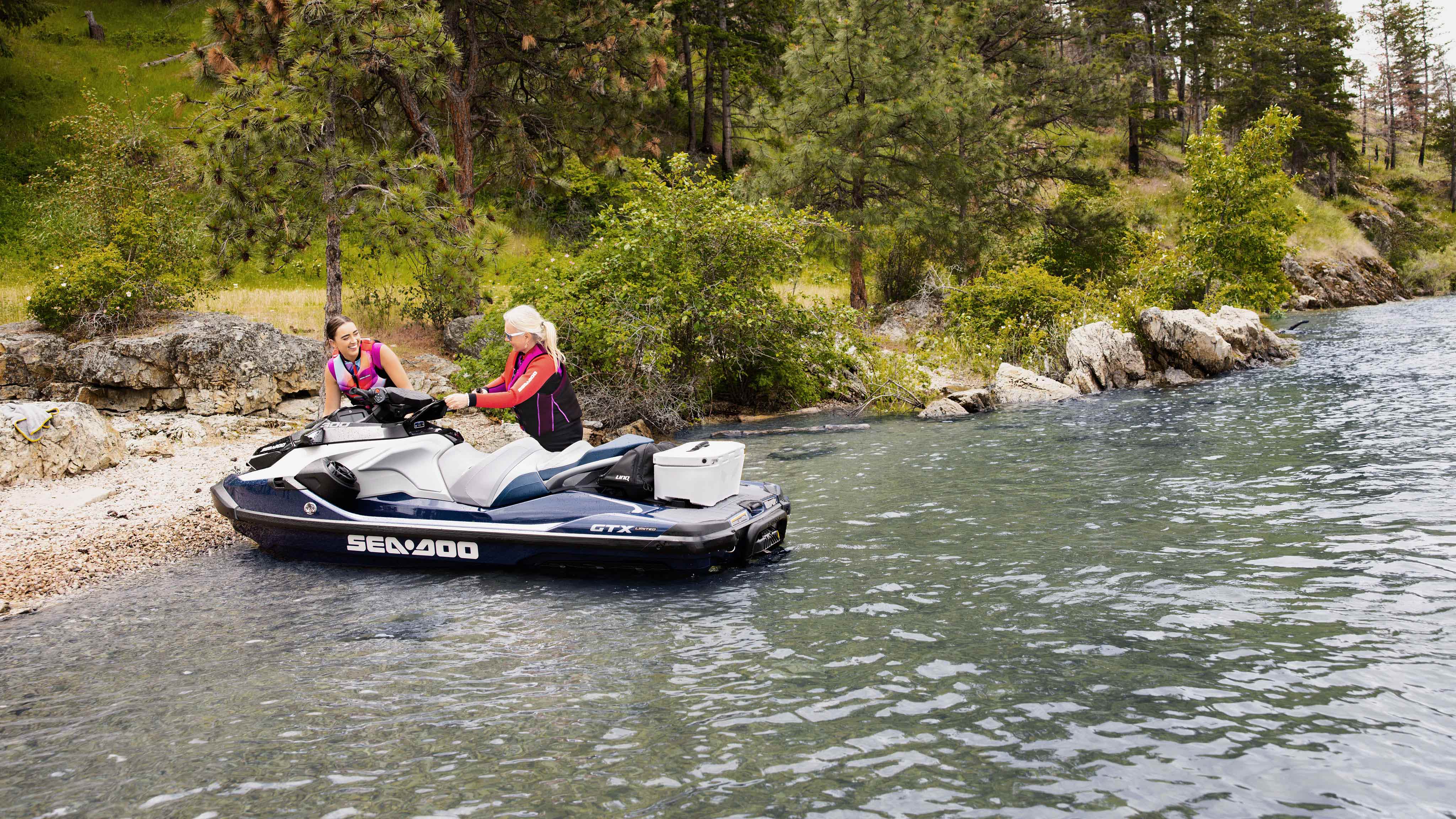 A mom and her daughter beaching the Sea-Doo GTX Limited