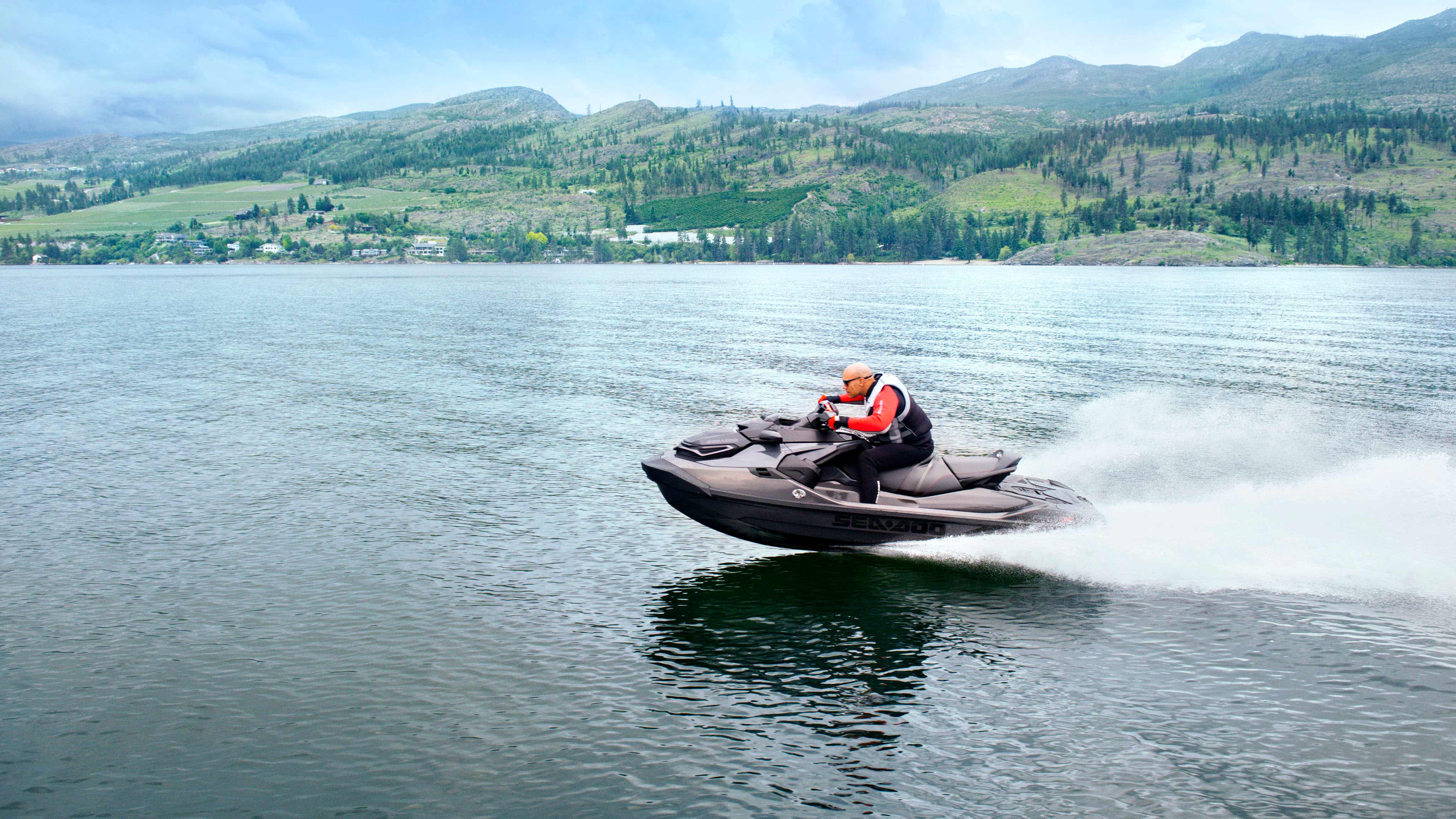 Man going full speed with the Sea-Doo RXT-X