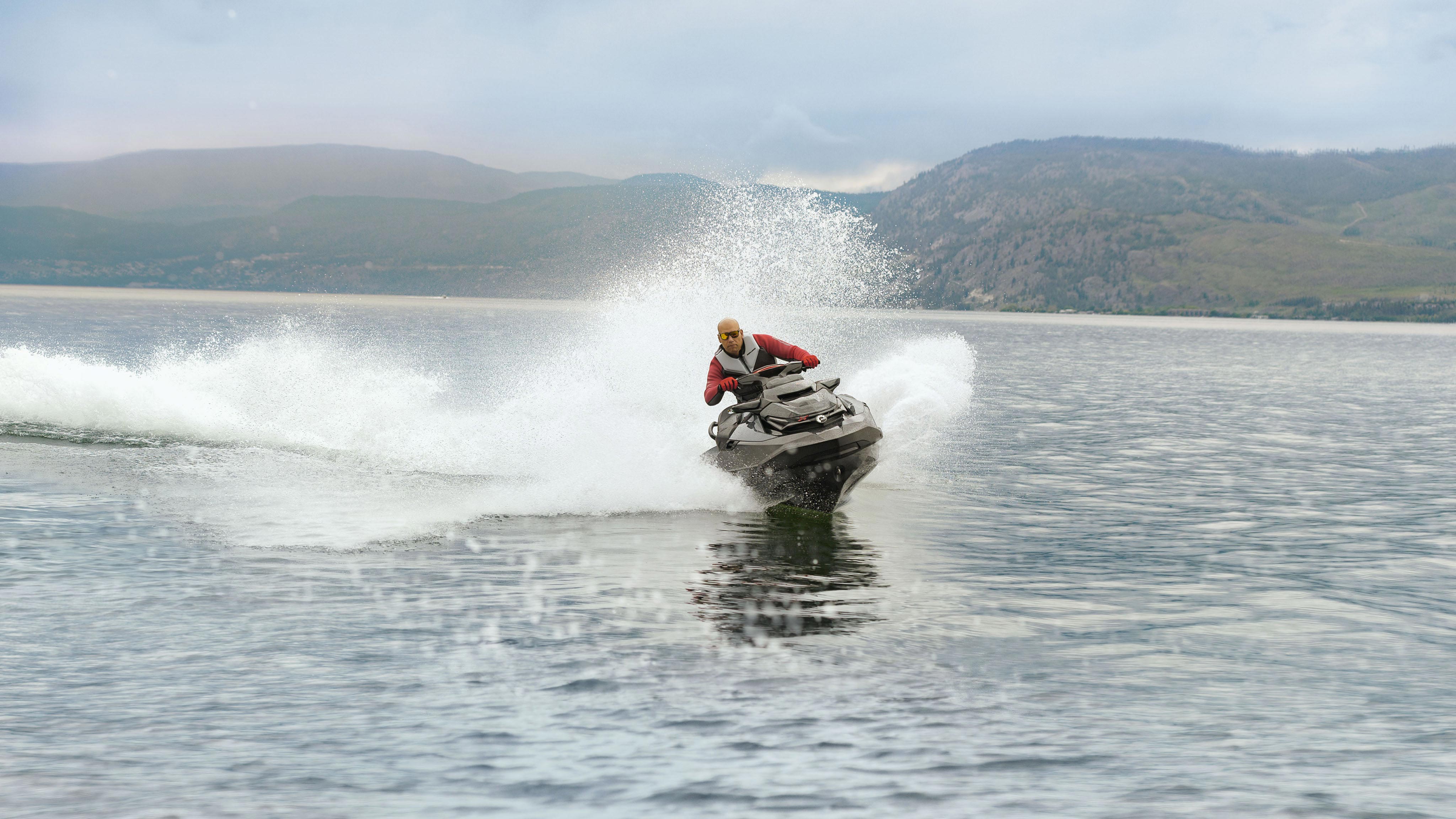 Man going full throttle on a Sea-Doo RXT-X