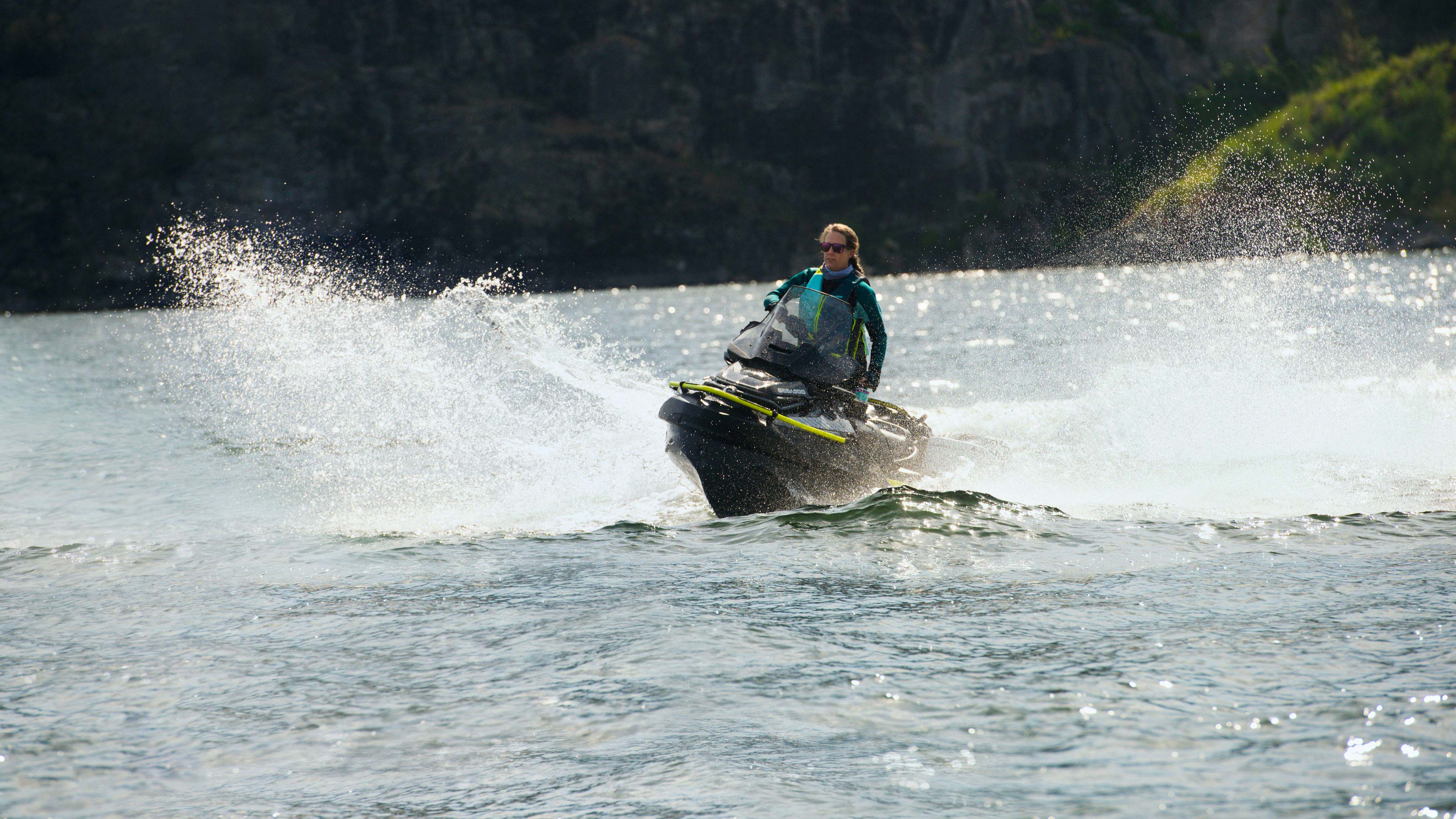 Woman riding the Sea-Doo Explorer Pro
