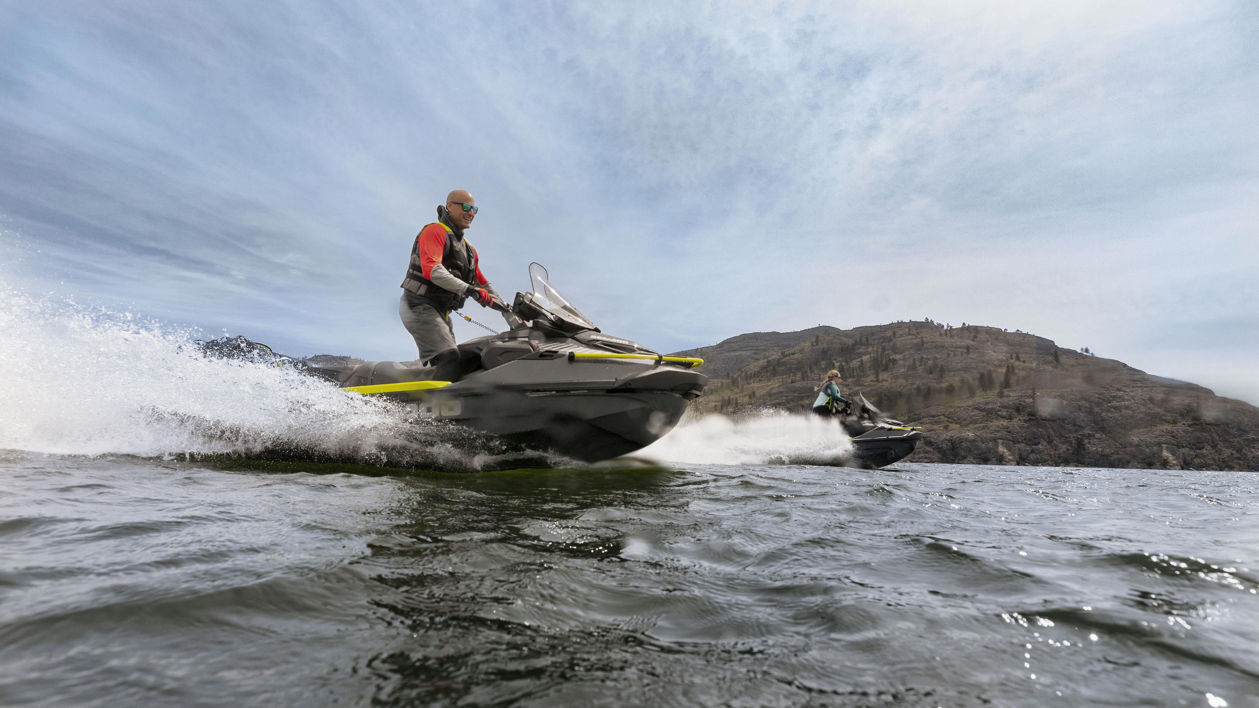 Two riders driving the new Sea-Doo Explorer Pro 