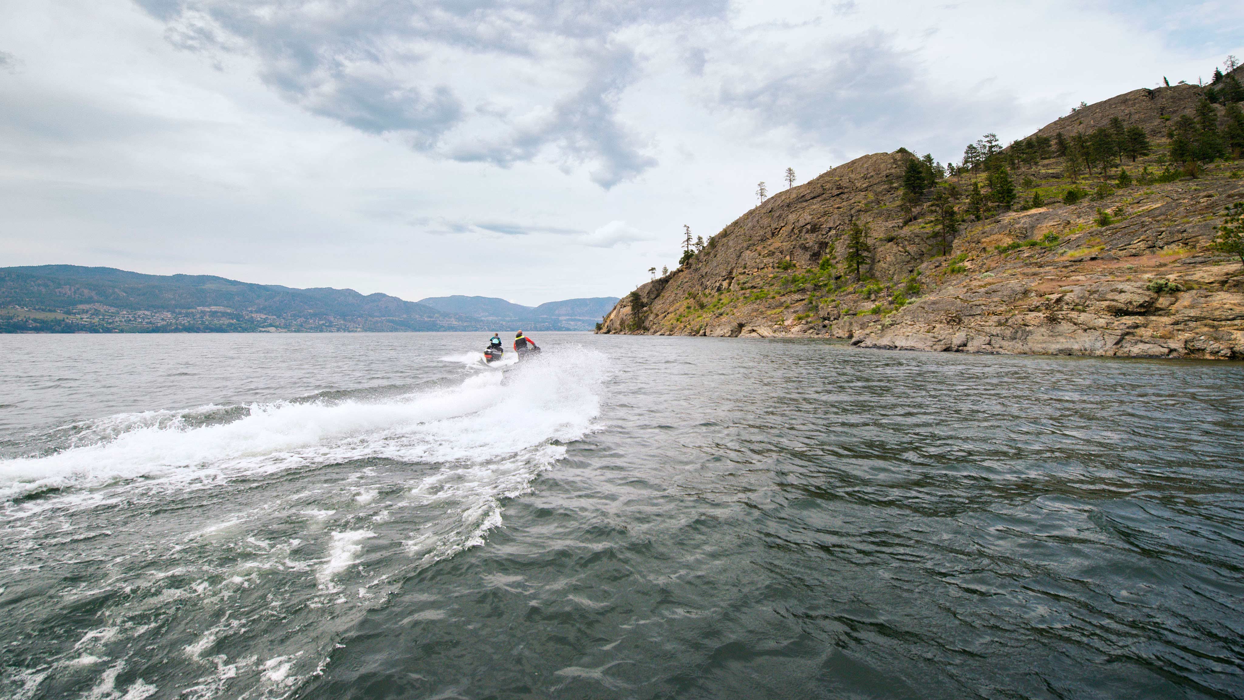 Two riders driving their new Sea-Doo Explorer Pro 170
