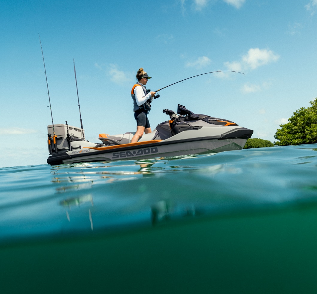 Woman fishing from a Sea-Doo Fish Pro Trophy