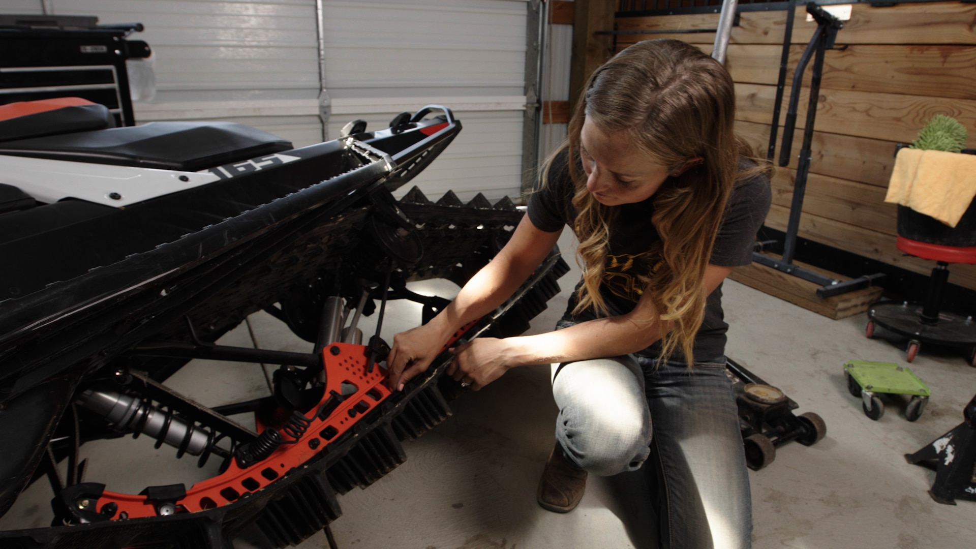 Stefanie Dean maintaining her deep snow snowmobile