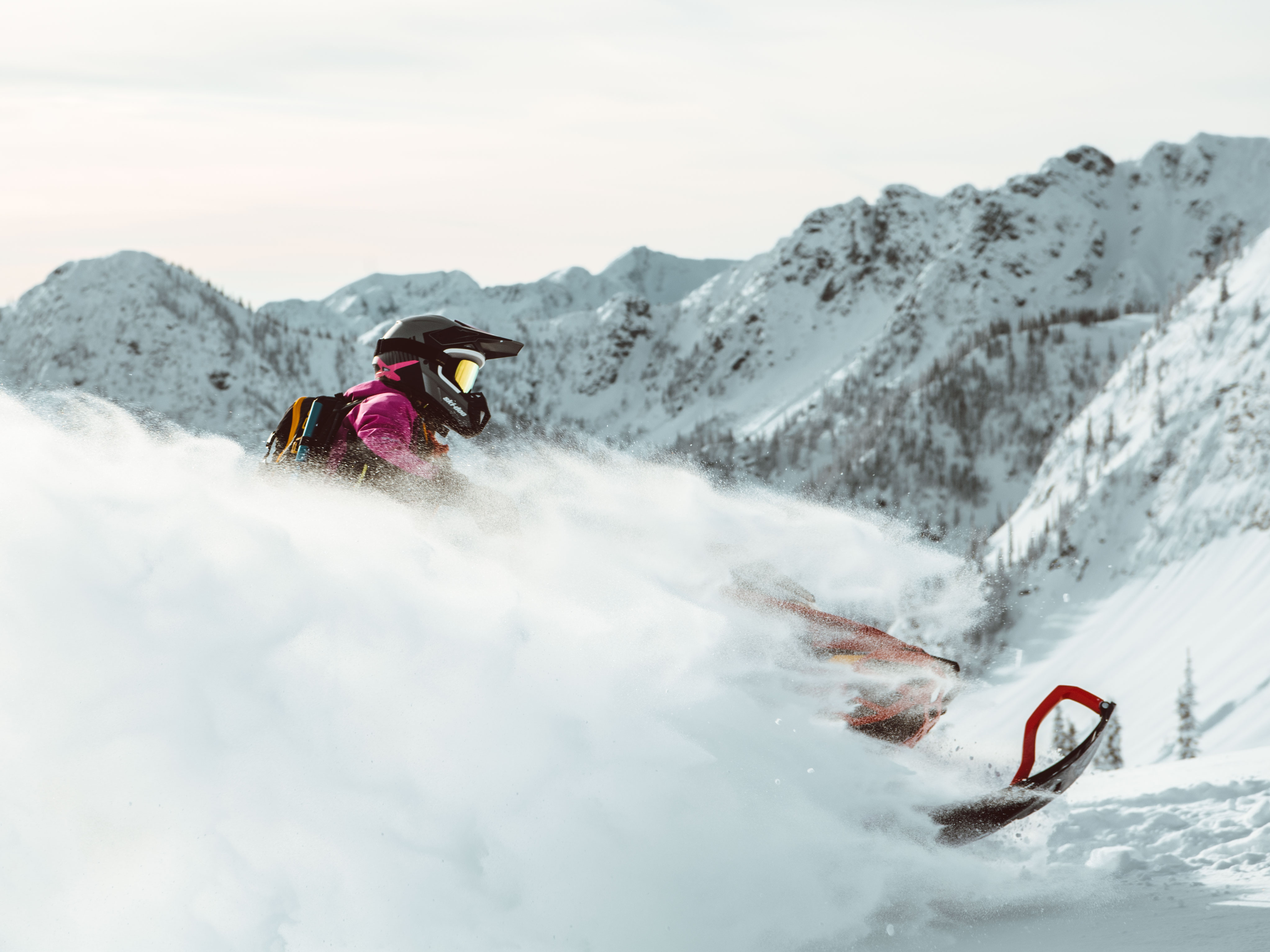 Ambassador Ashley Chaffin buried under deep snow on her Ski-Doo