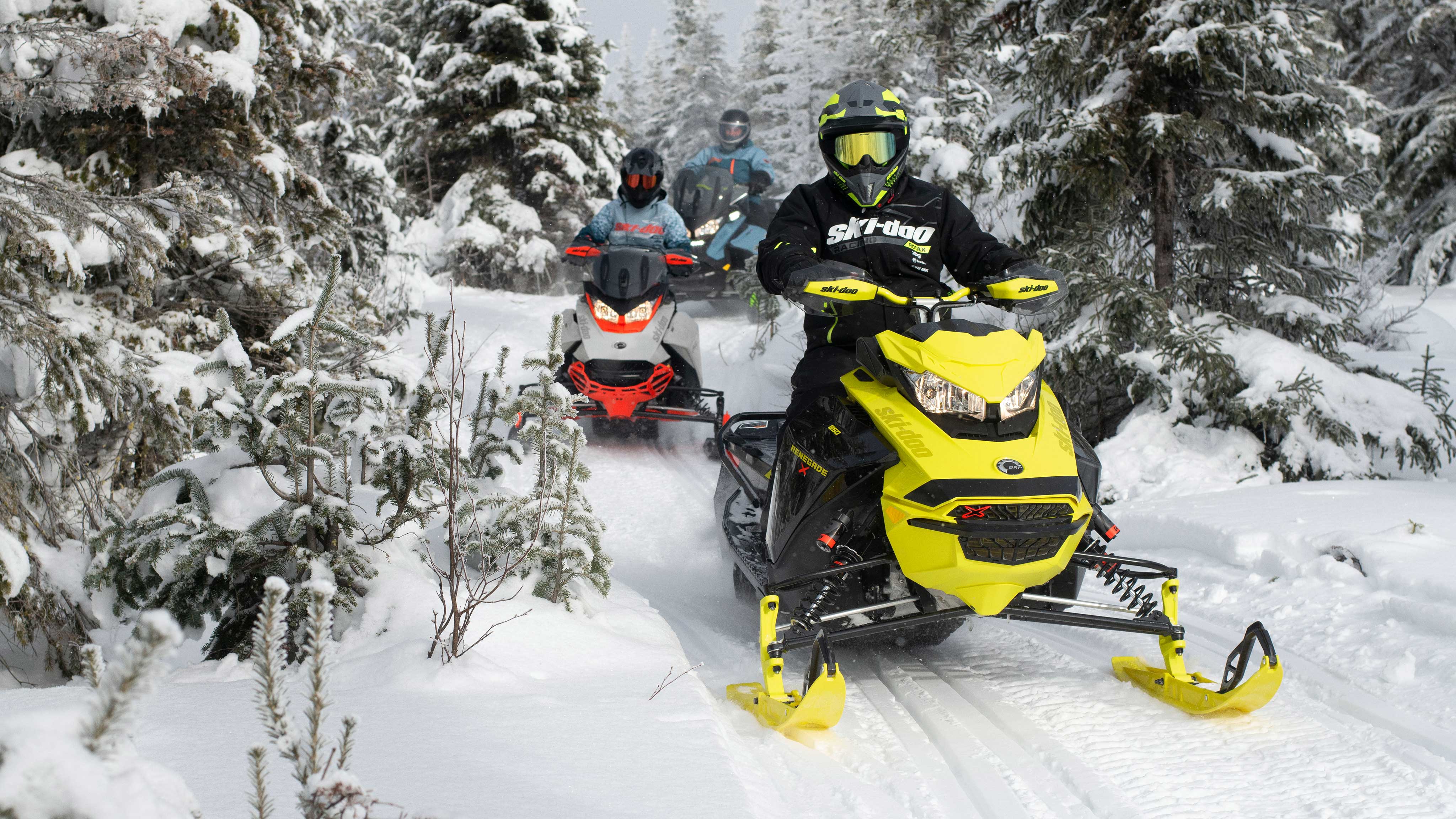 Group of riders driving the 2022 Ski-Doo lineup