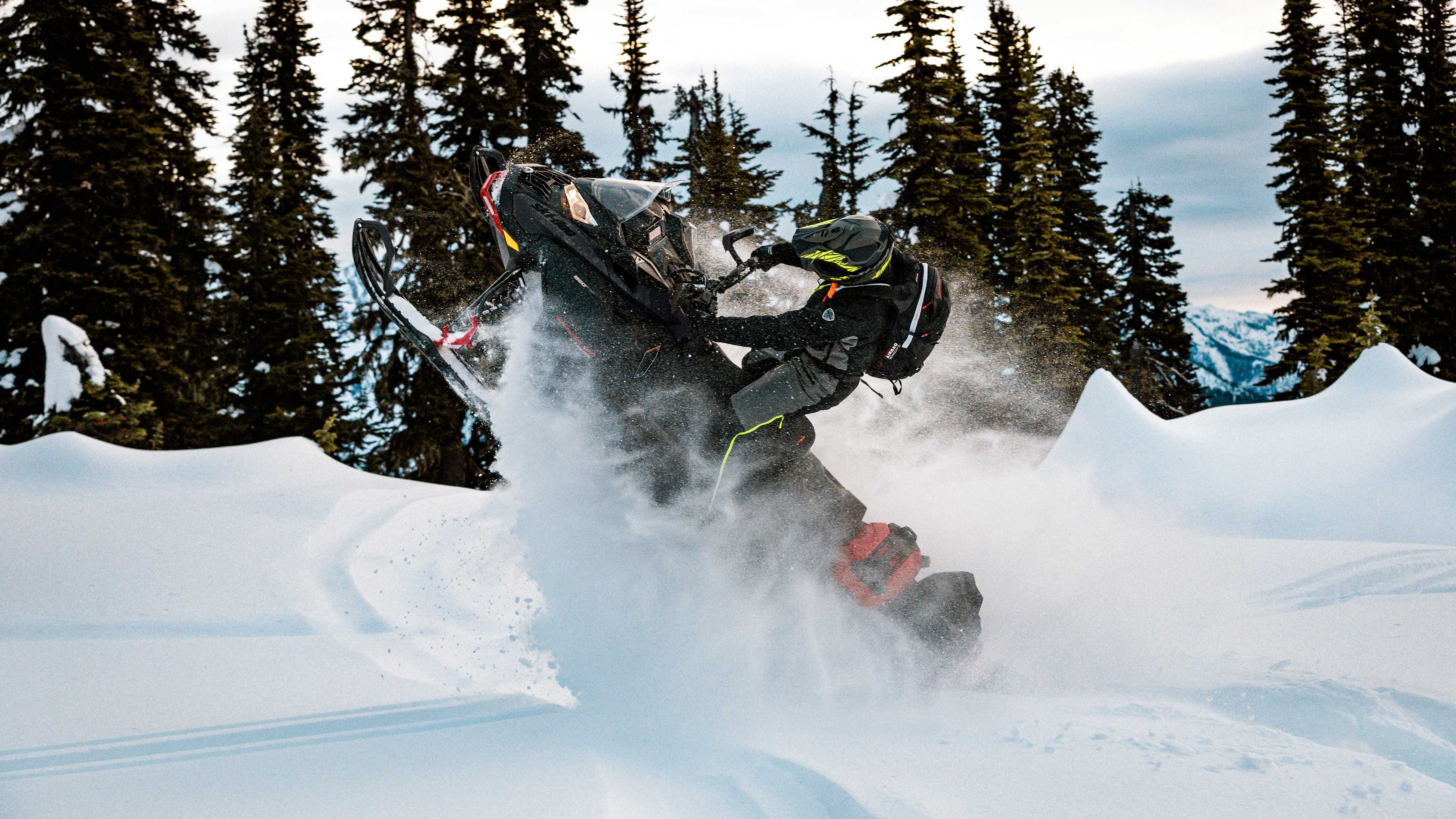 Man jumping with his Ski-Doo Expedition Xtreme