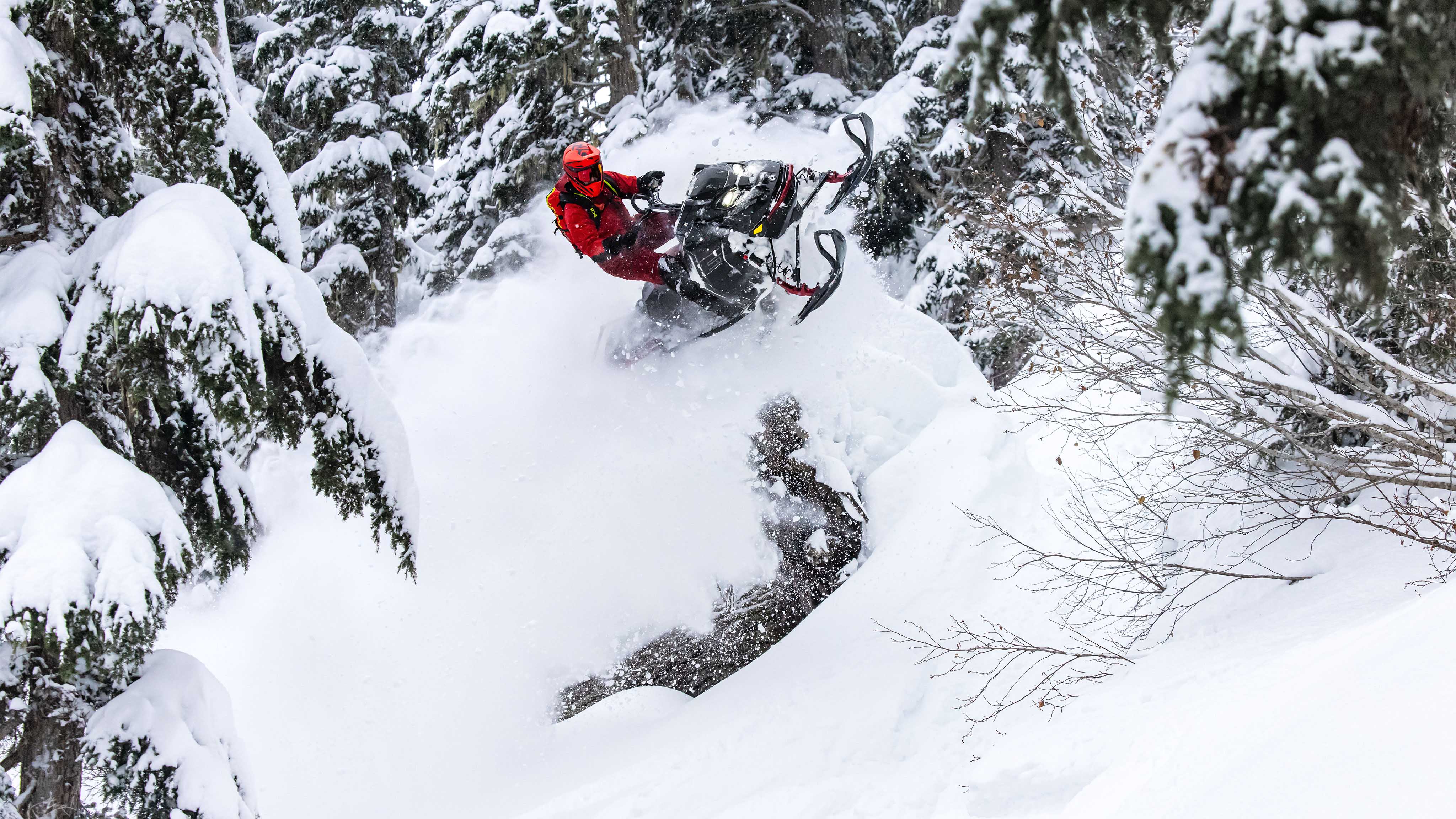 Man riding Off-Trail with the new Ski-doo deep snow snowmobile