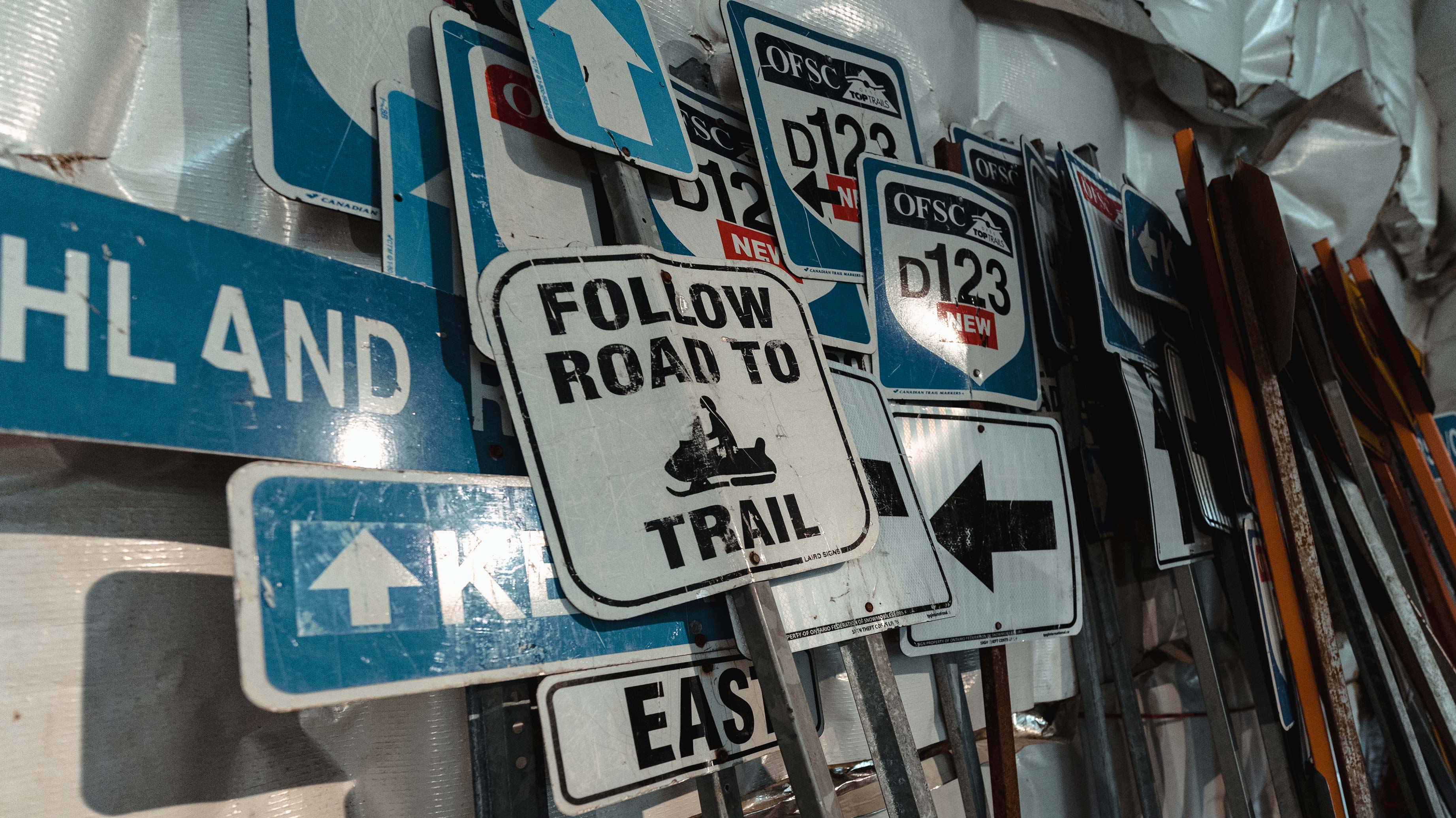 Snowmobile signs on a wall