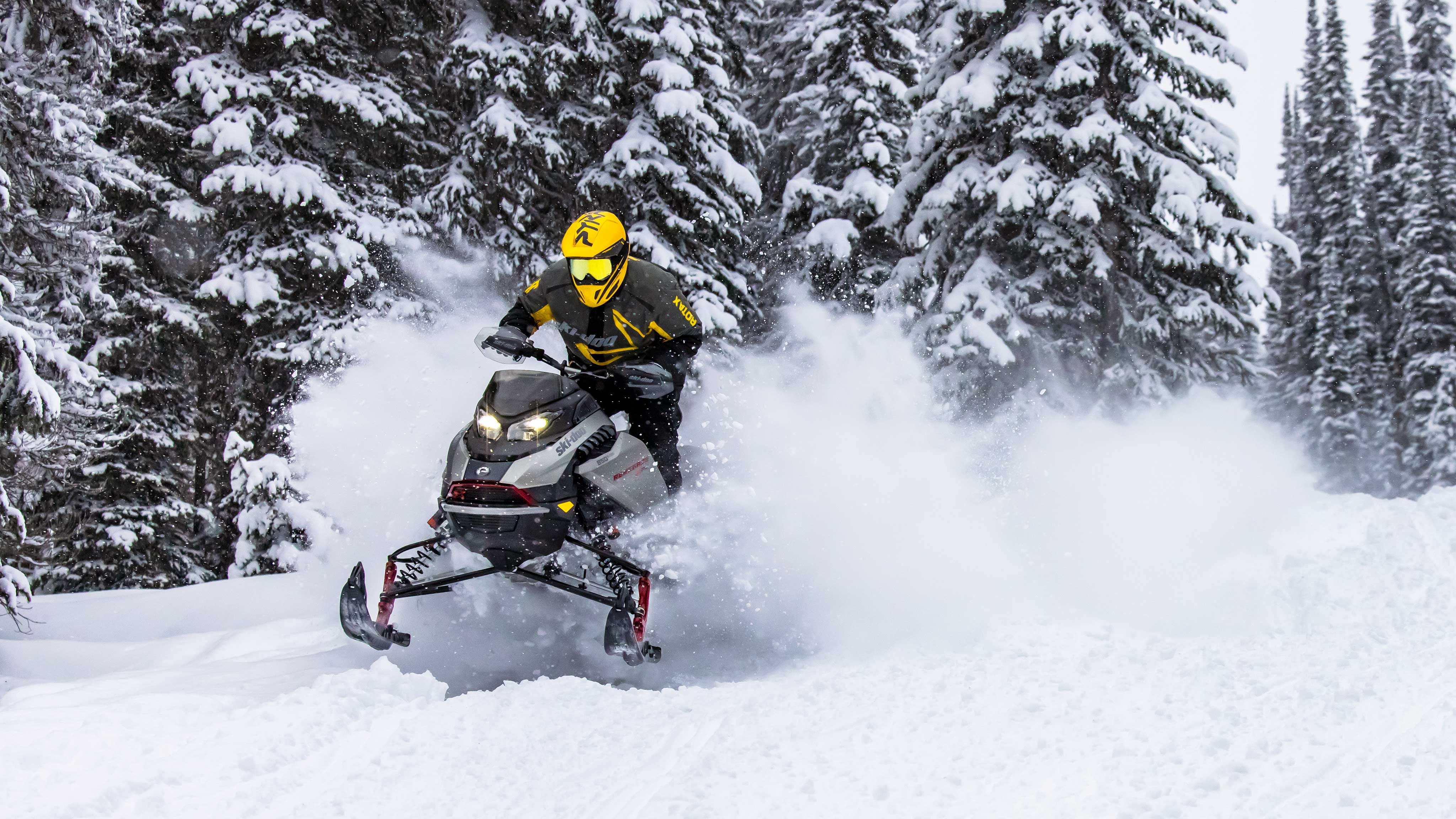 Man going fast on a trail with a Renegade X-RS