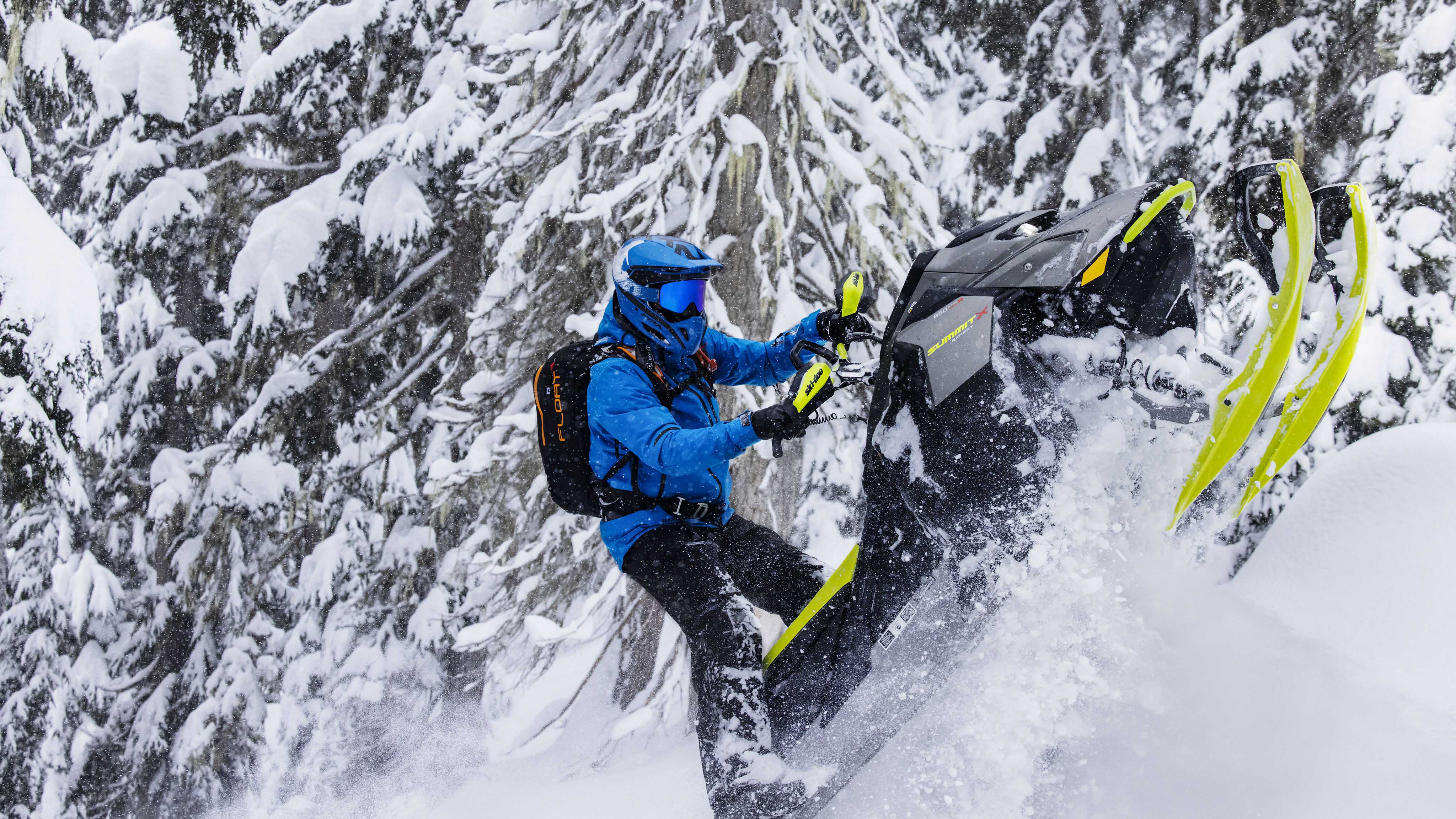 Man on a Ski-Doo Freeride and wearing the Pyra Helmet