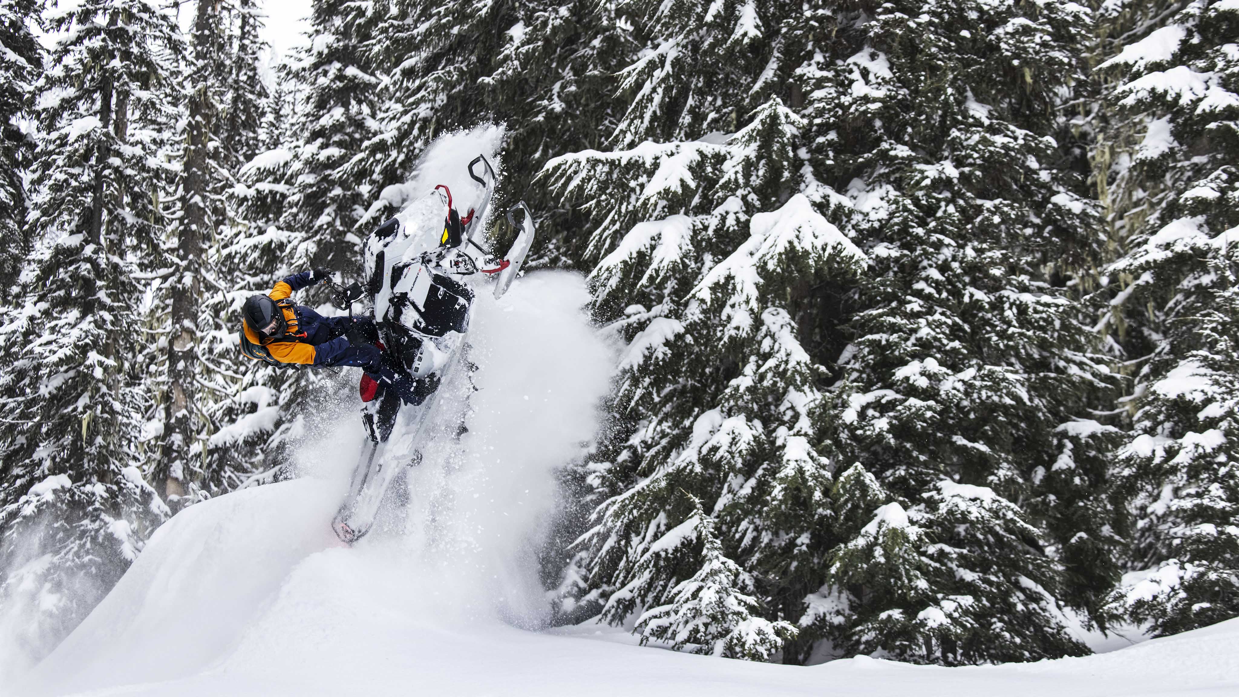 Man making a jump with the 2023 Ski-Doo Summit