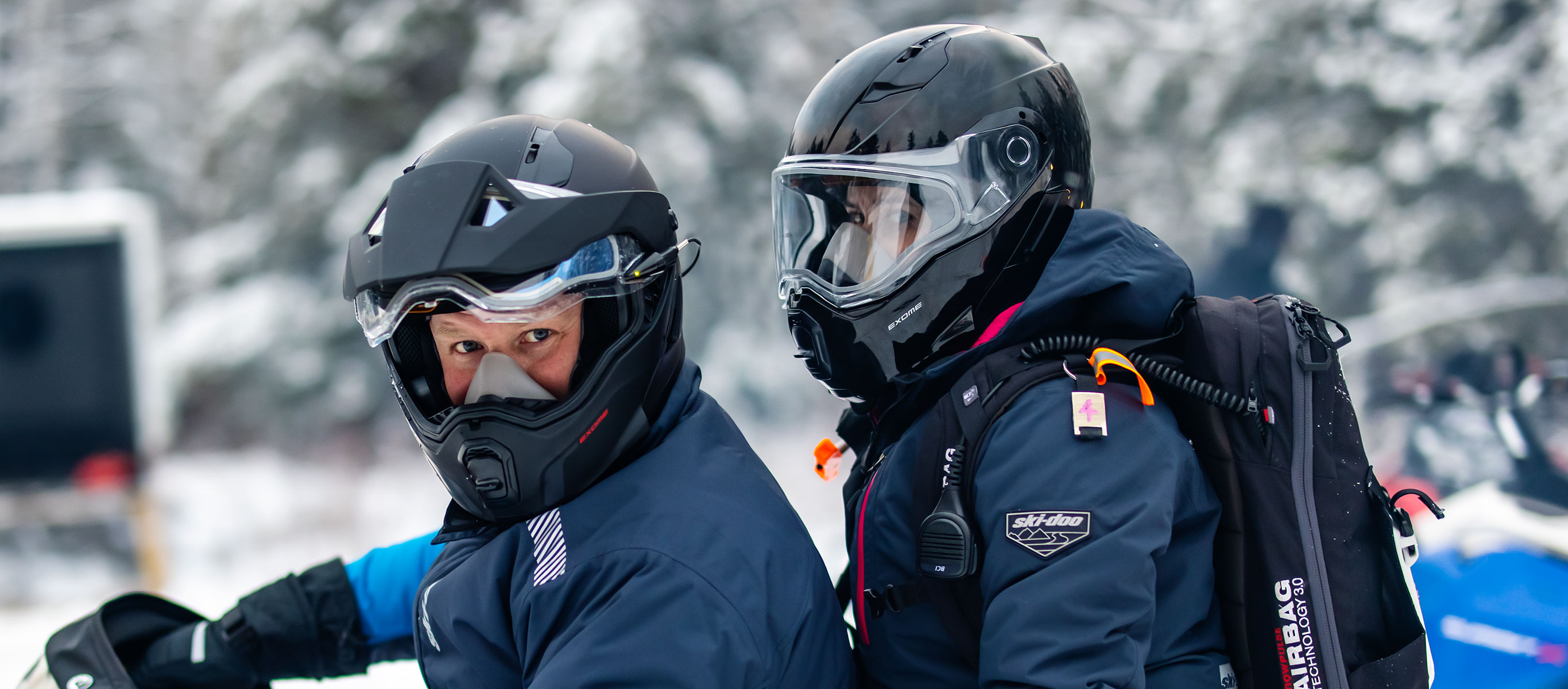 Couple wearing Exome helmets